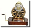 C.1903, Year Clock Co., New York, Year running clock in skeletonized form with dome.