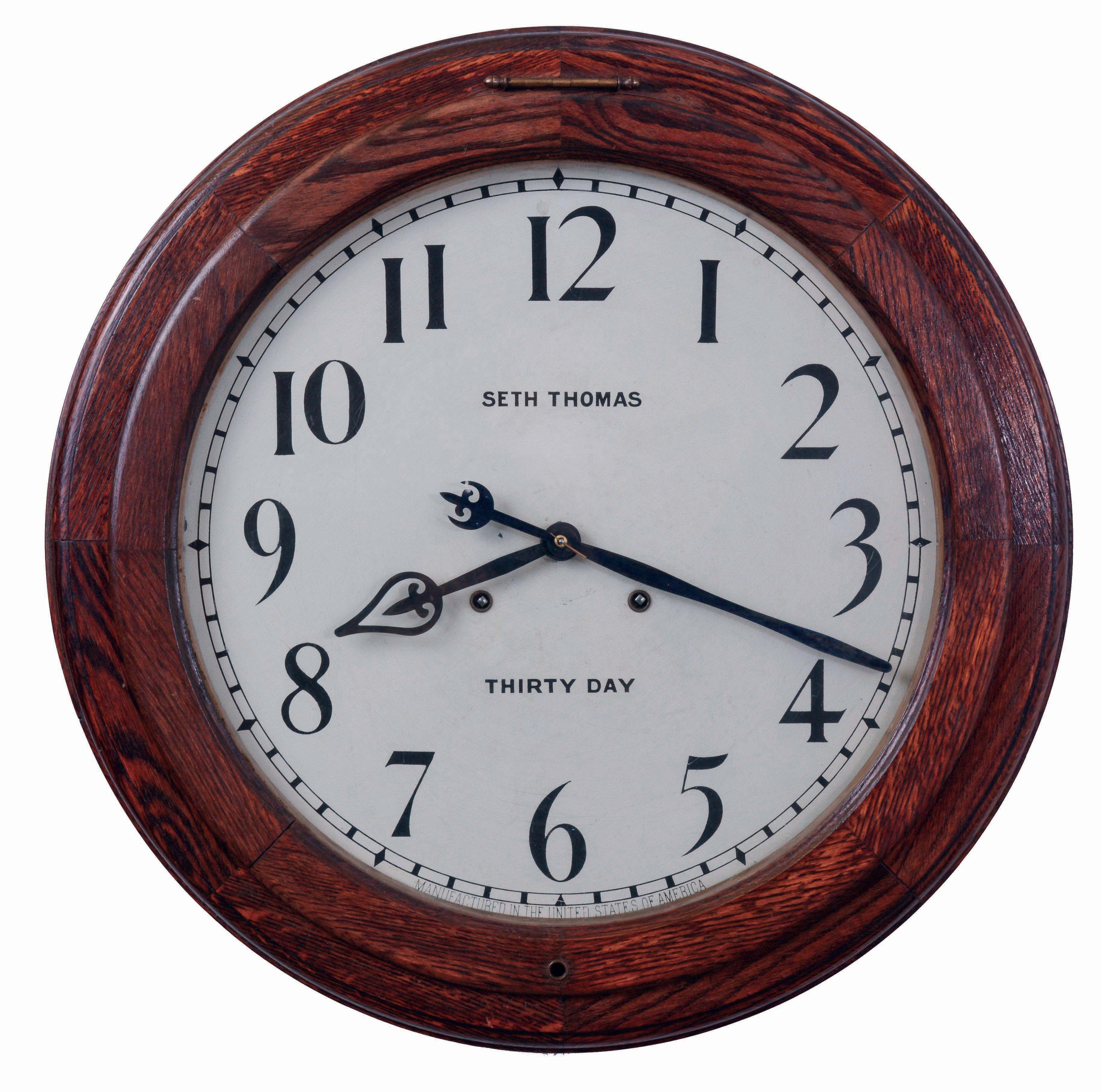 Seth Thomas Clock Co., Thomaston, Conn "Arcade" wall hanging gallery clock in an oak case with a 30 day double wind timepiece movement, c1909. — Antique Clocks Price Guide