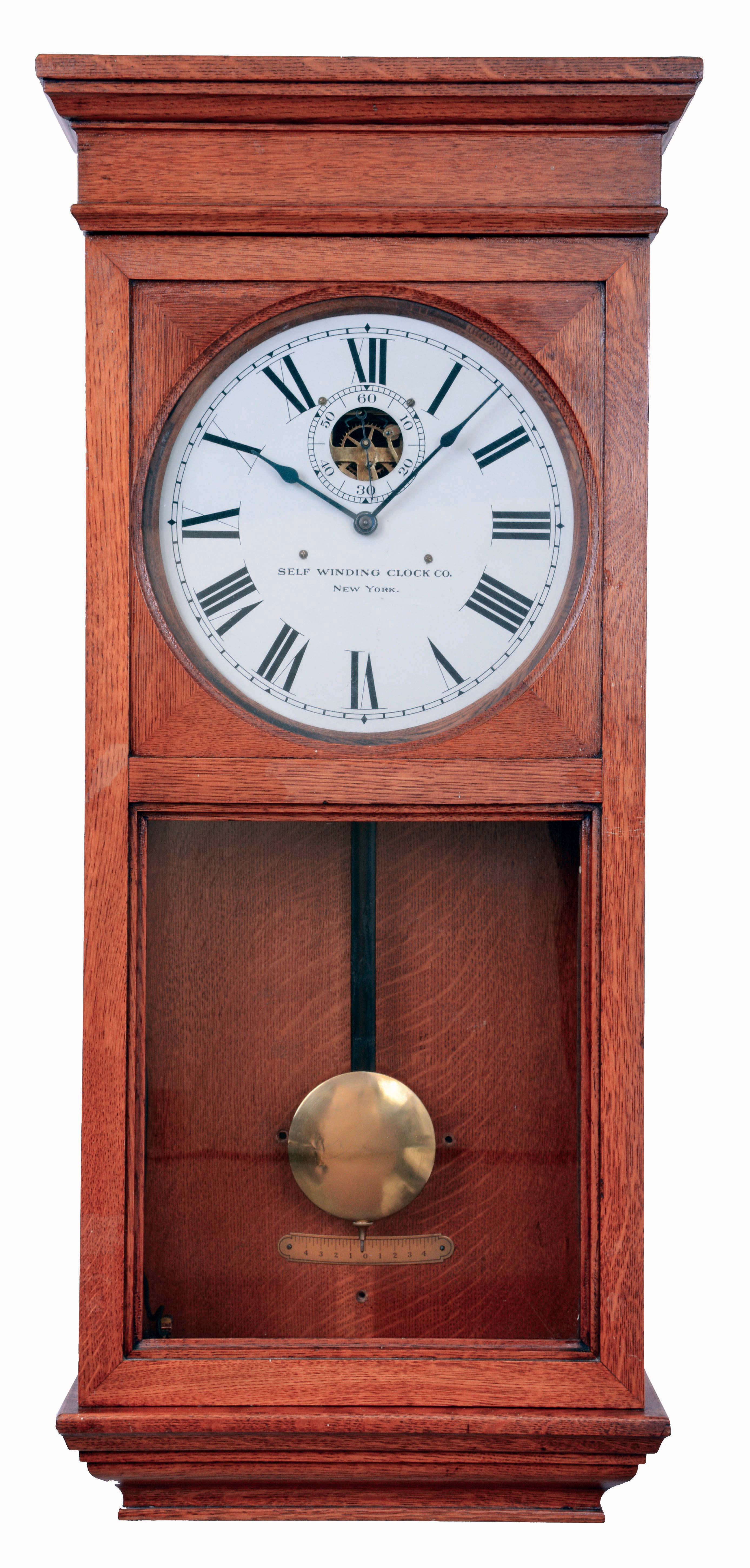 Self Winding Clock Co., New York, oak cased wall timepiece, model No. 18-A, with exposed escapement, c1910 — Antique Clocks Price Guide