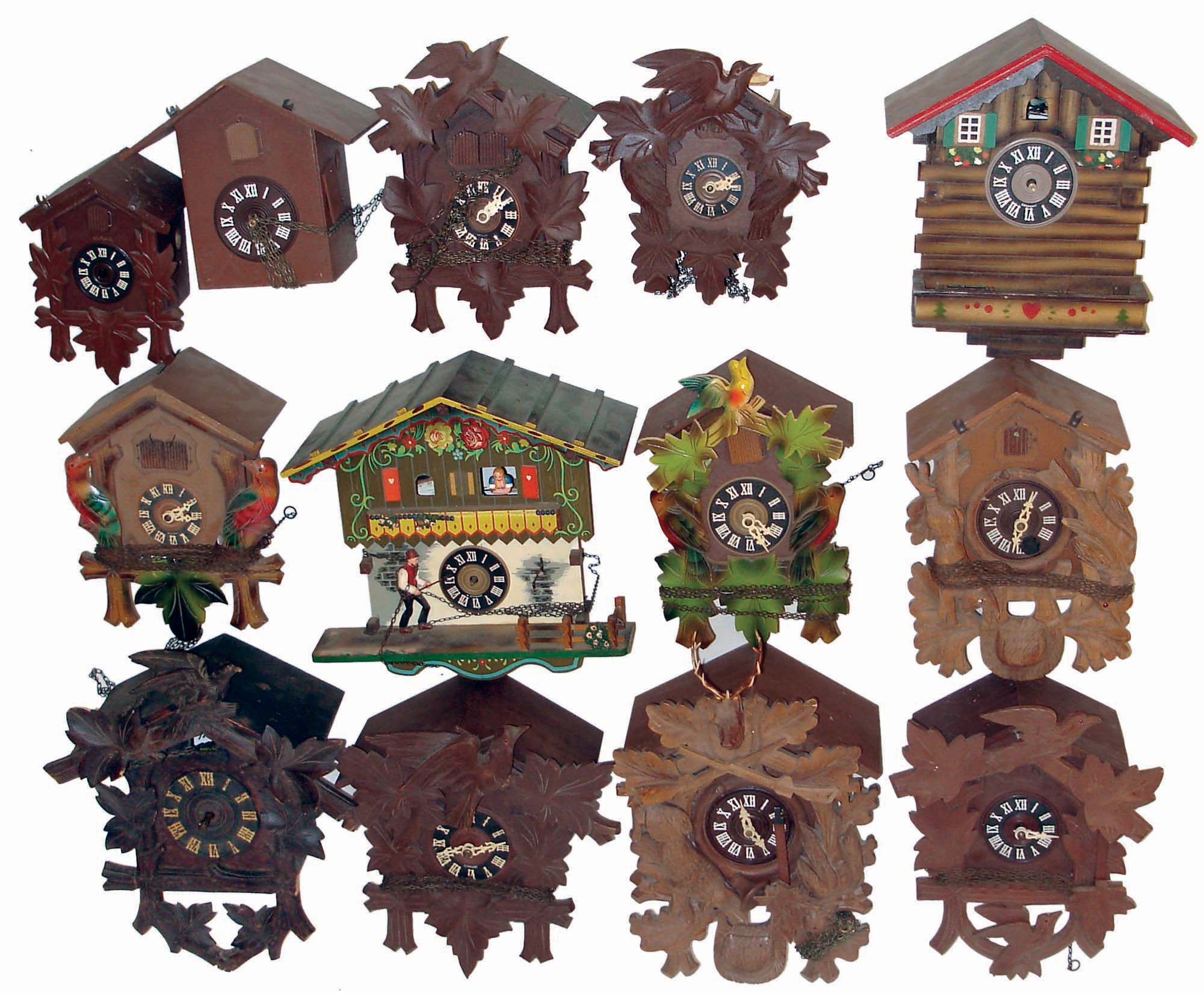 Cuckoo Clocks- 21 (Twenty-one) German weight driven hanging clocks, plus additional related material, 20th century — Antique Clocks Price Guide