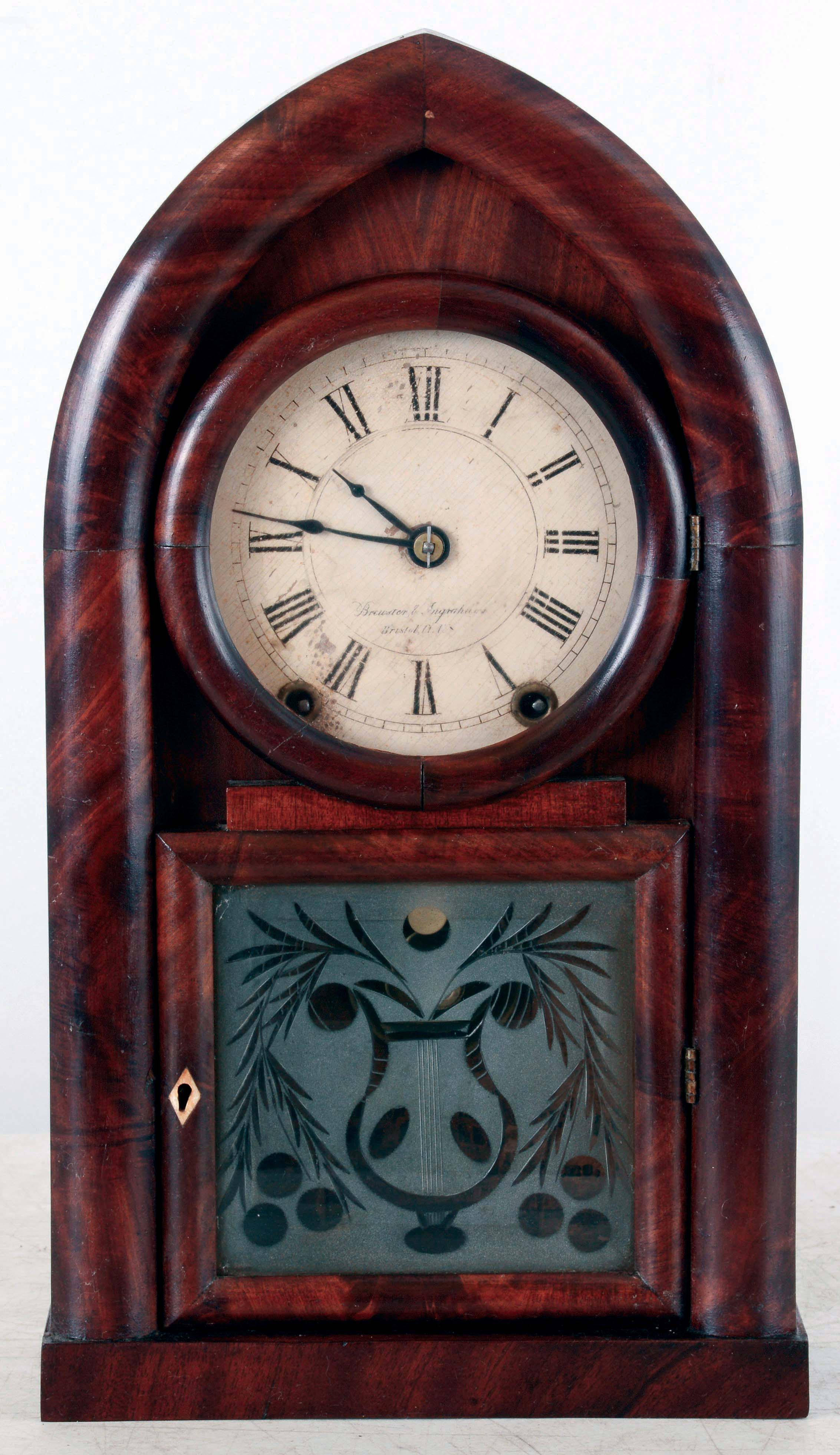 Brewster &amp; Ingrahams, Bristol, Conn., 8 days, time and strike, spring driven brass Kirk's patent movement round gothic or beehive clock, c1845 — Antique Clocks Price Guide