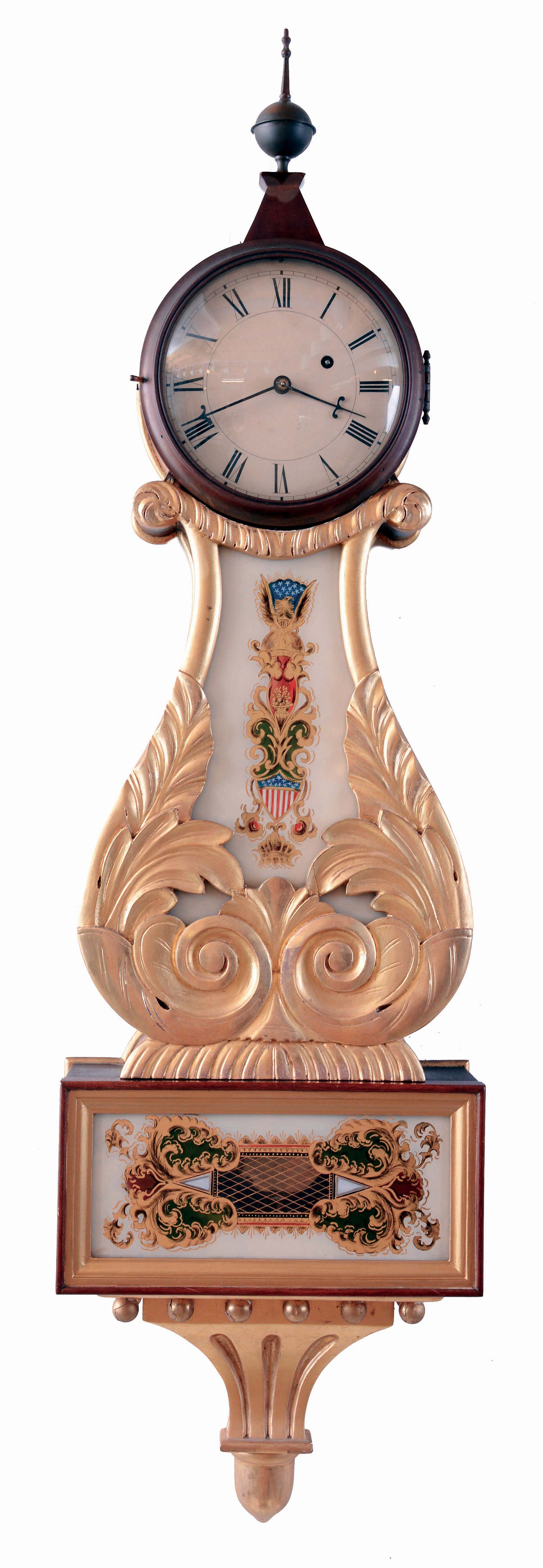 Lyre wall clock, weight driven, Massachusetts, gilt front mahogany case, leaf and scroll carved throat panel and lower door with paint decorated tablets, bottom with gilt bracket and acorn drop, Roman numeral painted metal dial, 8 days timepiece movement with front plate signed "E. Howard &amp; Co., Boston 28 1/2", with Howard pendulum, 20th century. — Antique Clocks Price Guide