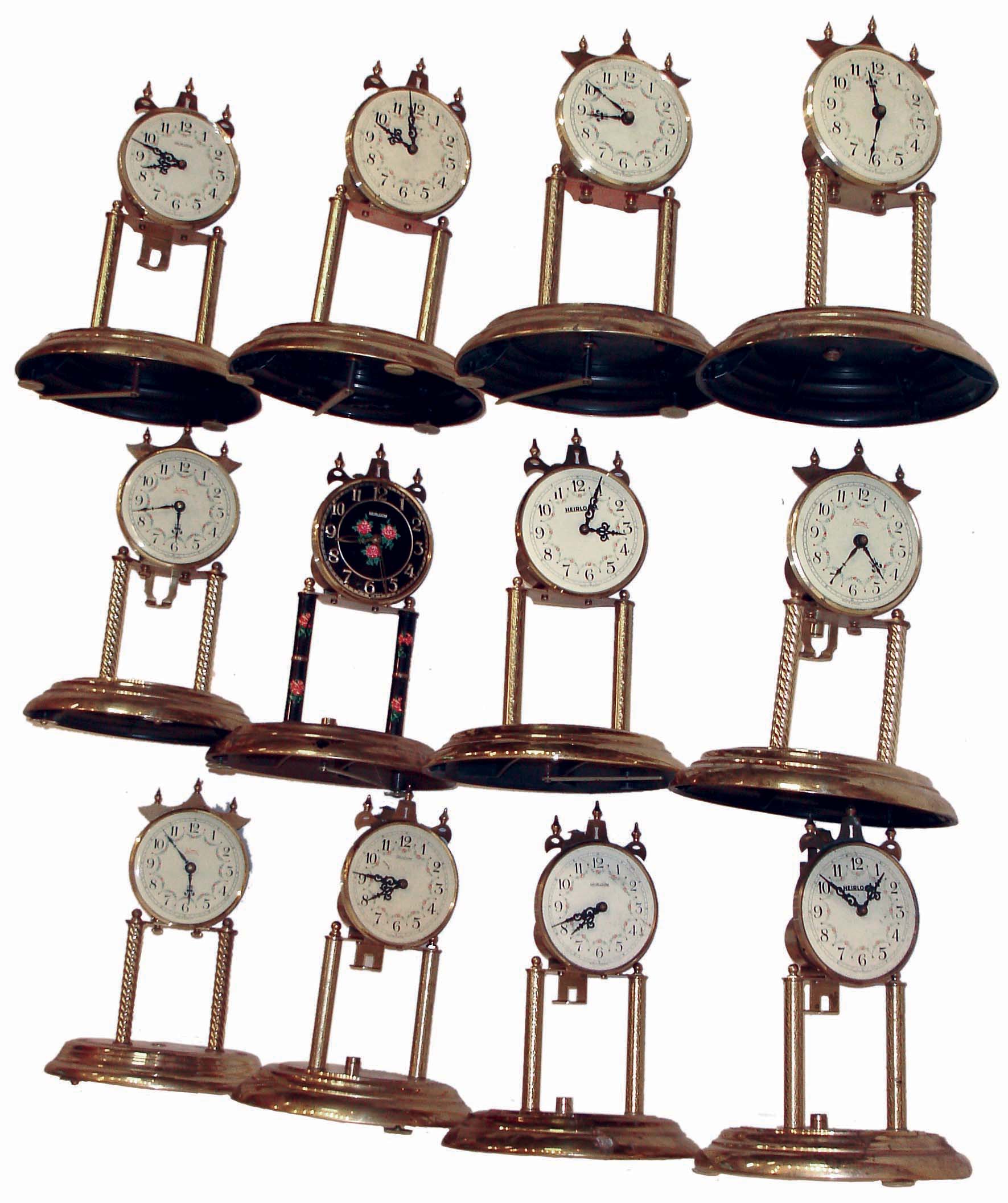 Clocks- 28 (Twenty-eight) 400 Day German movement and stands, 20 glass domes, many pendulums, 20th century — Antique Clocks Price Guide
