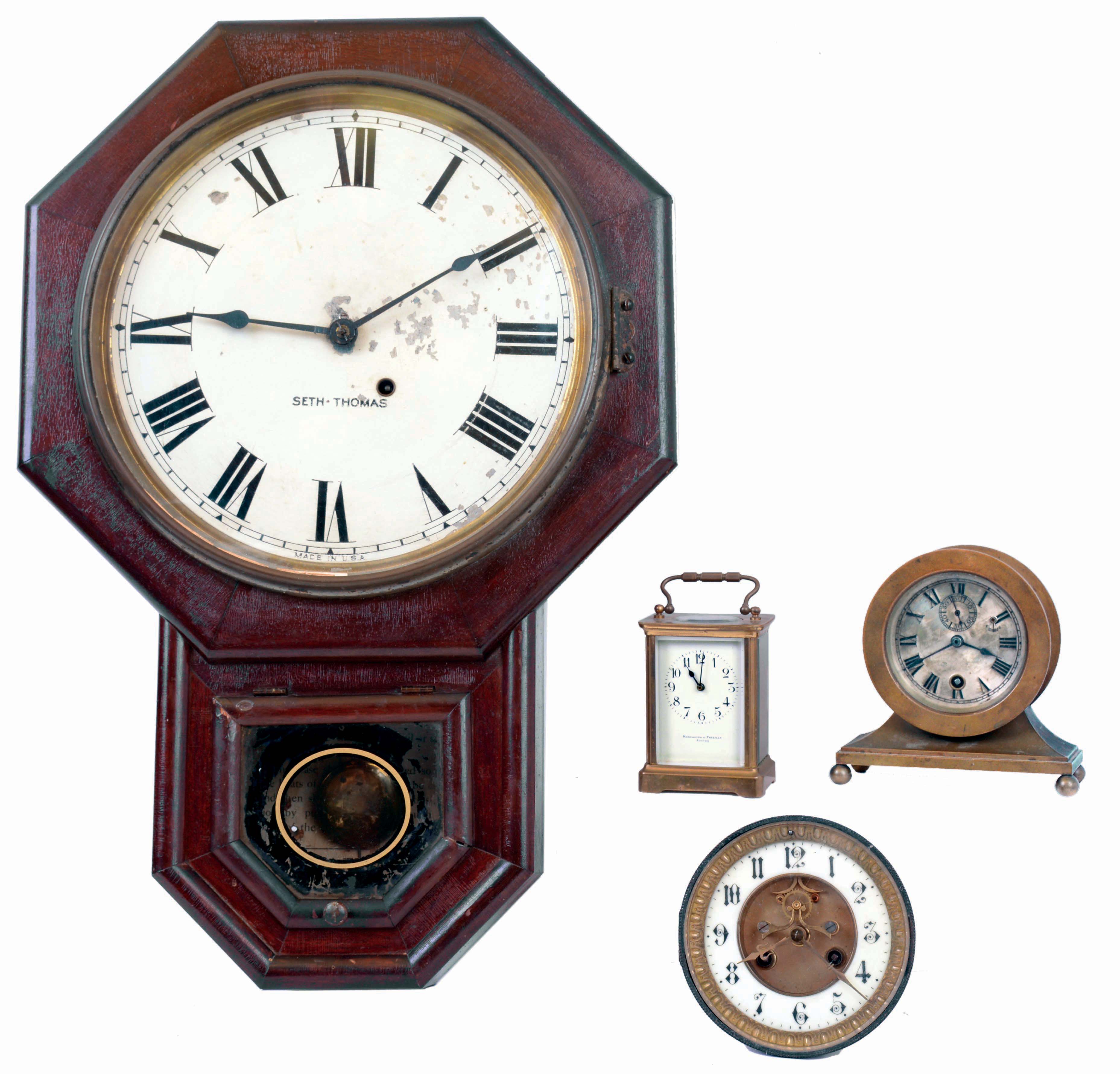 Clocks- 4 (Four) 8 day: (1) French time only, carriage clock, dial signed "Harrington &amp; Freeman, Boston"; (2) French, time and strike, (no case) movement and dial with visible escapement; (3) Chelsea time-only "base and ball" brass desk clock low number 16538; (4) Seth Thomas short drop octogonal wall clock; early 20th century — Antique Clocks Price Guide