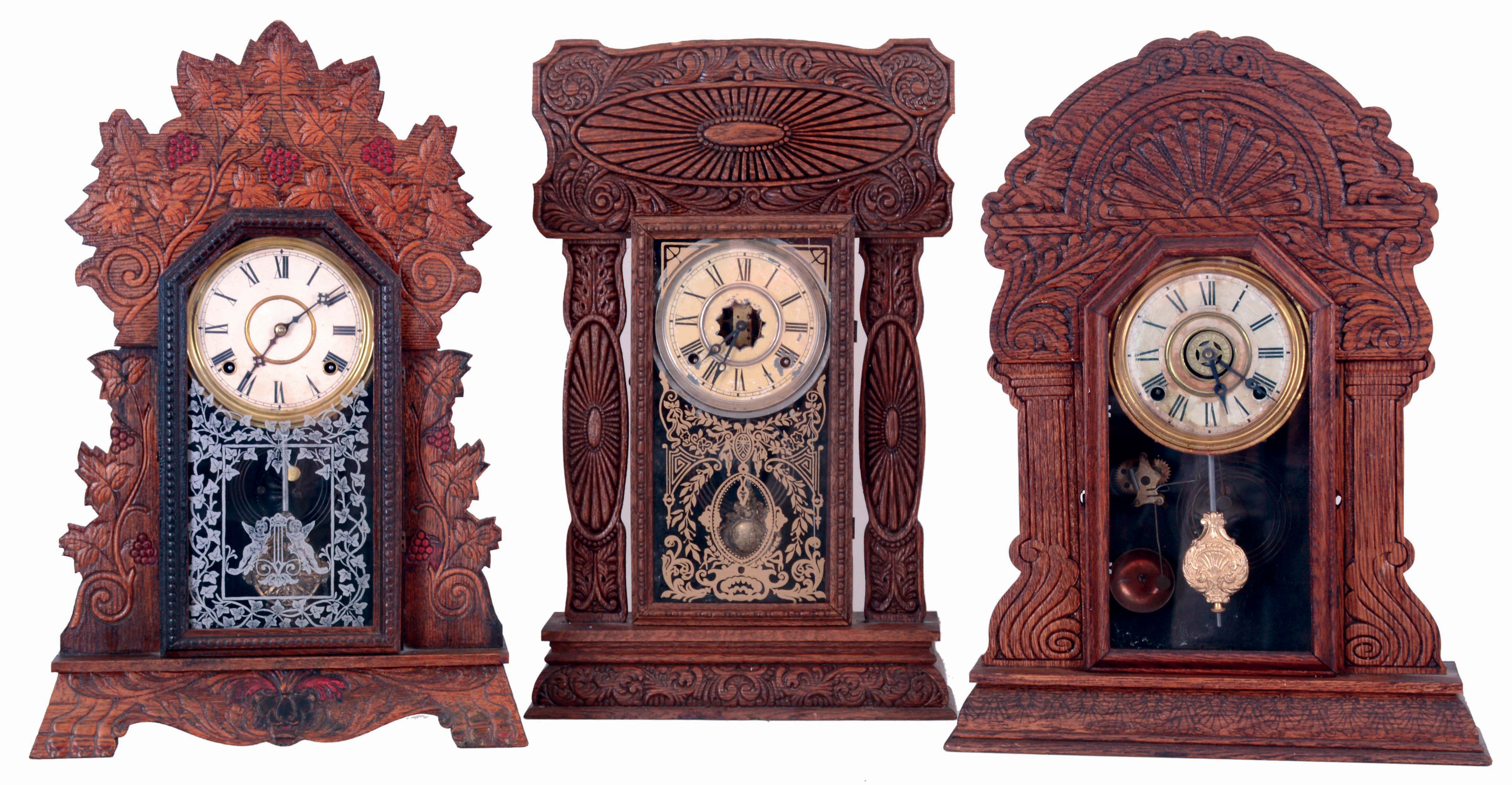 Clocks- 3 (Three): (1) Gilbert "Bouquet No. 50", 8 days, time and strike, spring driven brass movement shelf clock. (2) E. Ingraham &amp; Co., 8 days, time and strike, spring driven brass movement shelf clock. (3) Sessions Clock Co., "Elite No. 37", 8 days, time, strike and alarm, spring driven brass movement shelf clock, all c1905. — Antique Clocks Price Guide