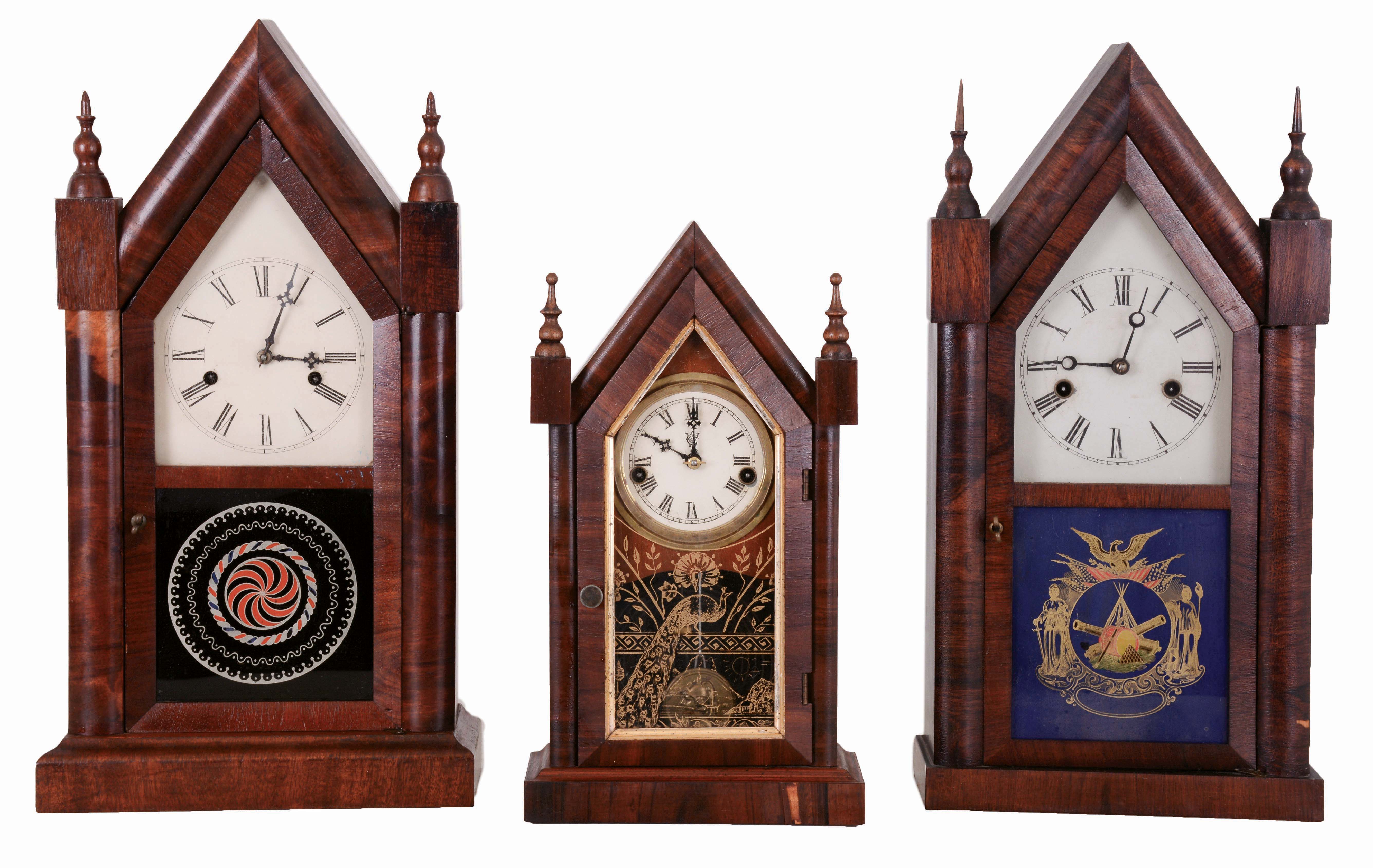 Clocks- 3 (Three) American: (1) Waterbury Clock Co., 30 hours, time and strike, spring driven brass movement "Small Gothic, V. P." steeple clock, c1900; (2) E. N. Welch Mfg. Co., 30 hours, time and strike, spring driven brass movement Sharp Gothic or Steeple clock, c1870; (3) Ansonia Clock Co., 30 hours, time and strike, spring driven brass movement Sharp Gothic or Steeple clock, c1880. — Antique Clocks Price Guide