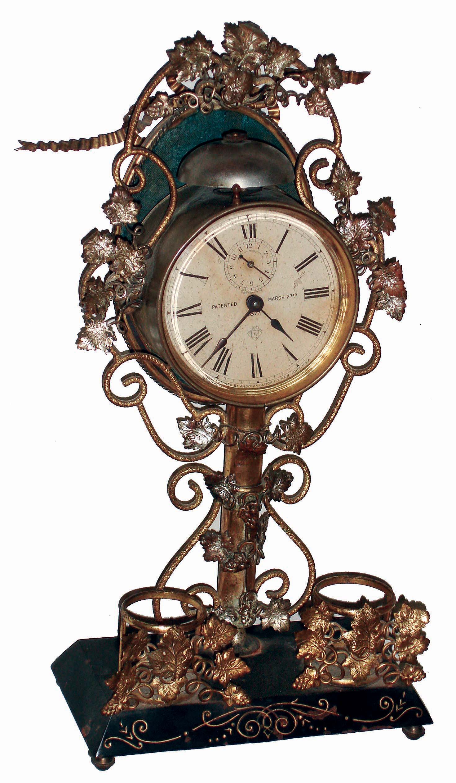 Ansonia Clock Co., New York, NY, "Marguerite", 30 hours, and alarm nickel and gilt finish novelty clock with mirror and perfume bottle stand, c1883 — Antique Clocks Price Guide