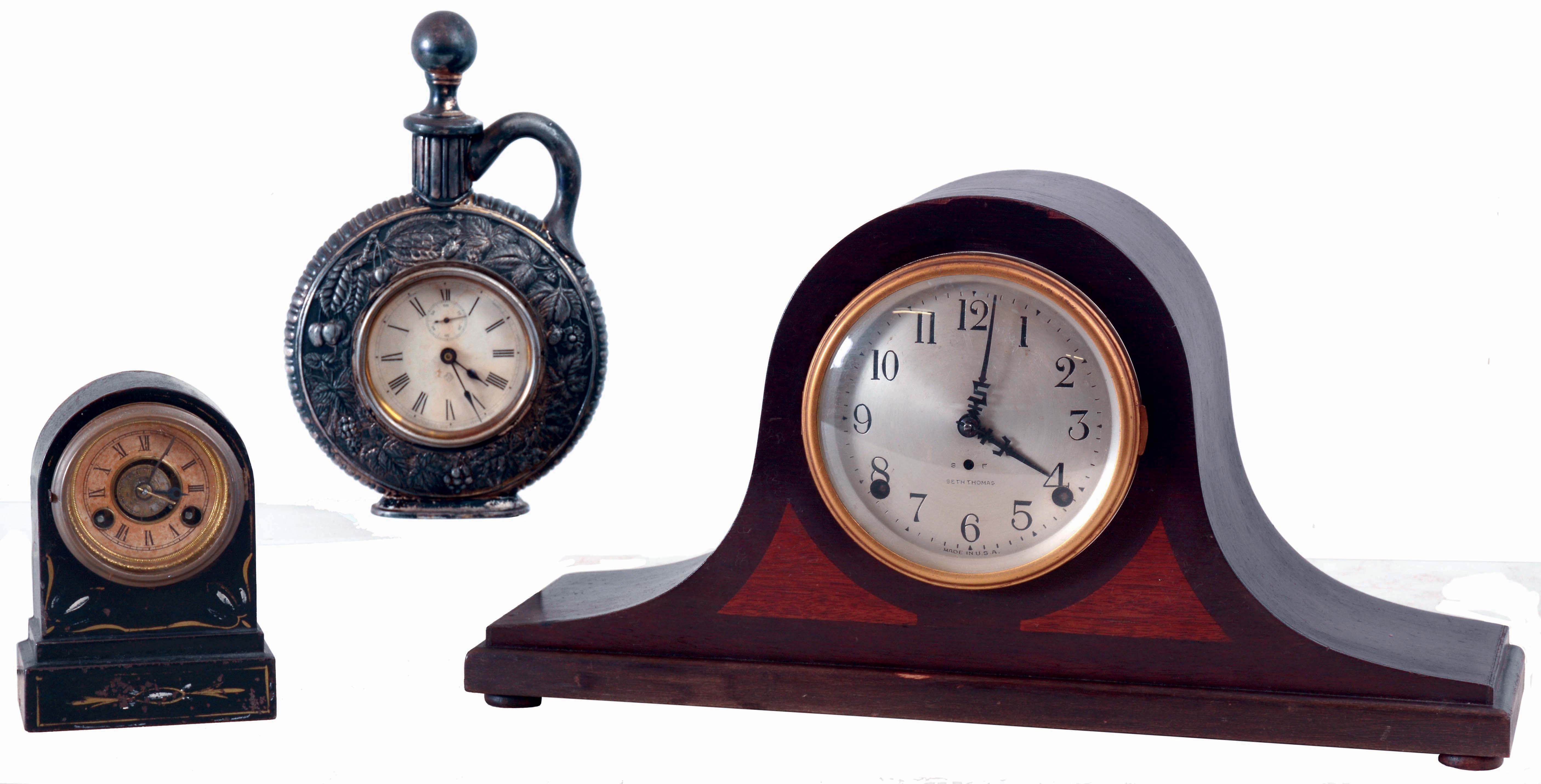 Clocks- 3 (Three) American: (1) Terry Clock Co., Waterbury, Conn. "Patent Alarm Time-Piece" in an iron front case with a spring driven, 30 hours, time and alarm movement, c1870. (2) Seth Thomas Clock Co., Thomaston, Conn. "Sentinel 2" tambour mantle clock in a mahogany case with a spring driven, 8 days, time and hour/half-hour strike No. 89 movement, c1928. (3) Ansonia Clock Co., New York, NY, "Jug" novelty shelf clock in a silver and gilt finish with a 30 hour timepiece movement, c1886. — Antique Clocks Price Guide