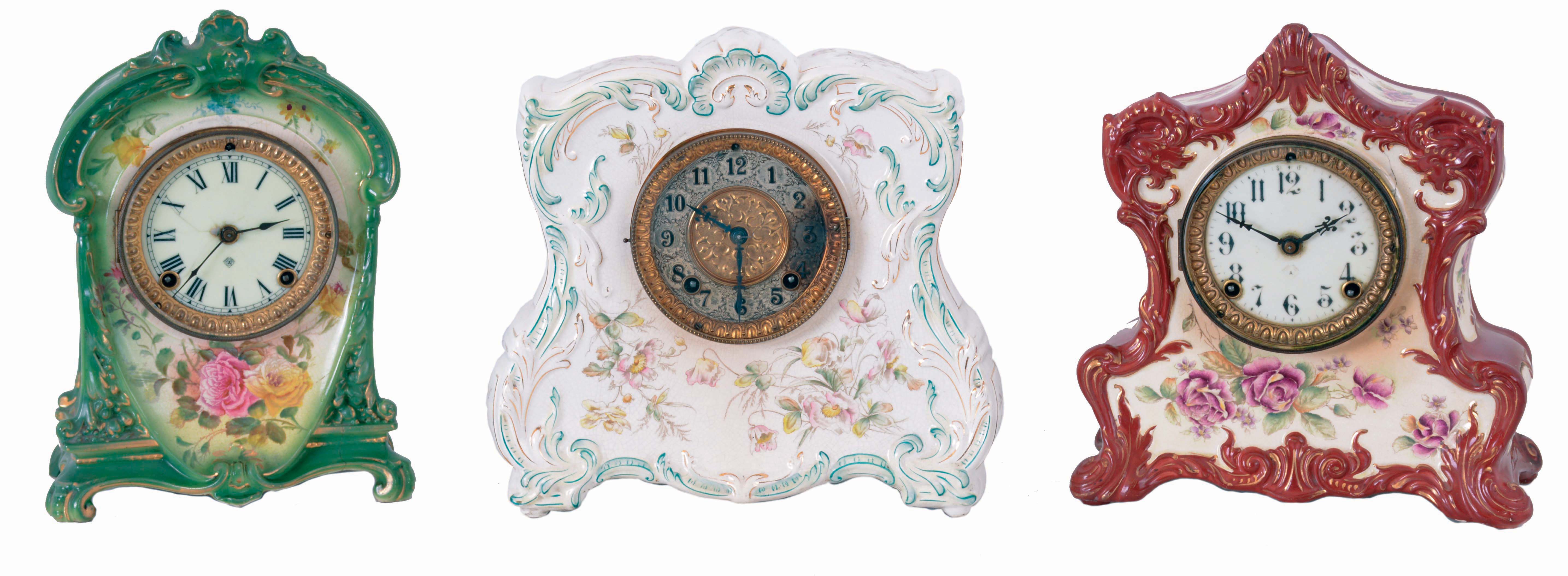 Clocks- 3 (Three): American porcelain clocks: (1) Gilbert Clock Co., Winsted, Conn., "No. 410" porcelain shelf clock with spring driven, 8 days, time and hour/half-hour rack strike movement, c1898. (2) Ansonia Clock Co., New York, NY, "Wampum" porcelain shelf clock with spring driven, 8 days, time and hour/half-hour strike movement, c1900. (3) Ansonia Clock Co., New York, NY, "La Cruz" Royal Bonn porcelain shelf clock with spring driven, 8 days, time and hour/half-hour strike movement, c1904. — Antique Clocks Price Guide