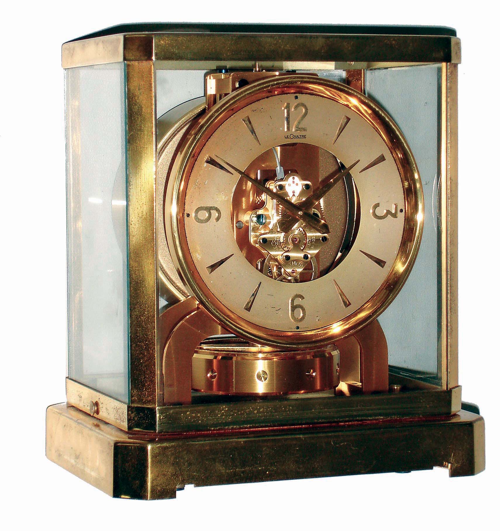 Jaeger LeCoultre, Swiss "Atmos" gold-plated brass and glass mantel clock wound by atmospheric changes, serial #35121, c1955 — Antique Clocks Price Guide