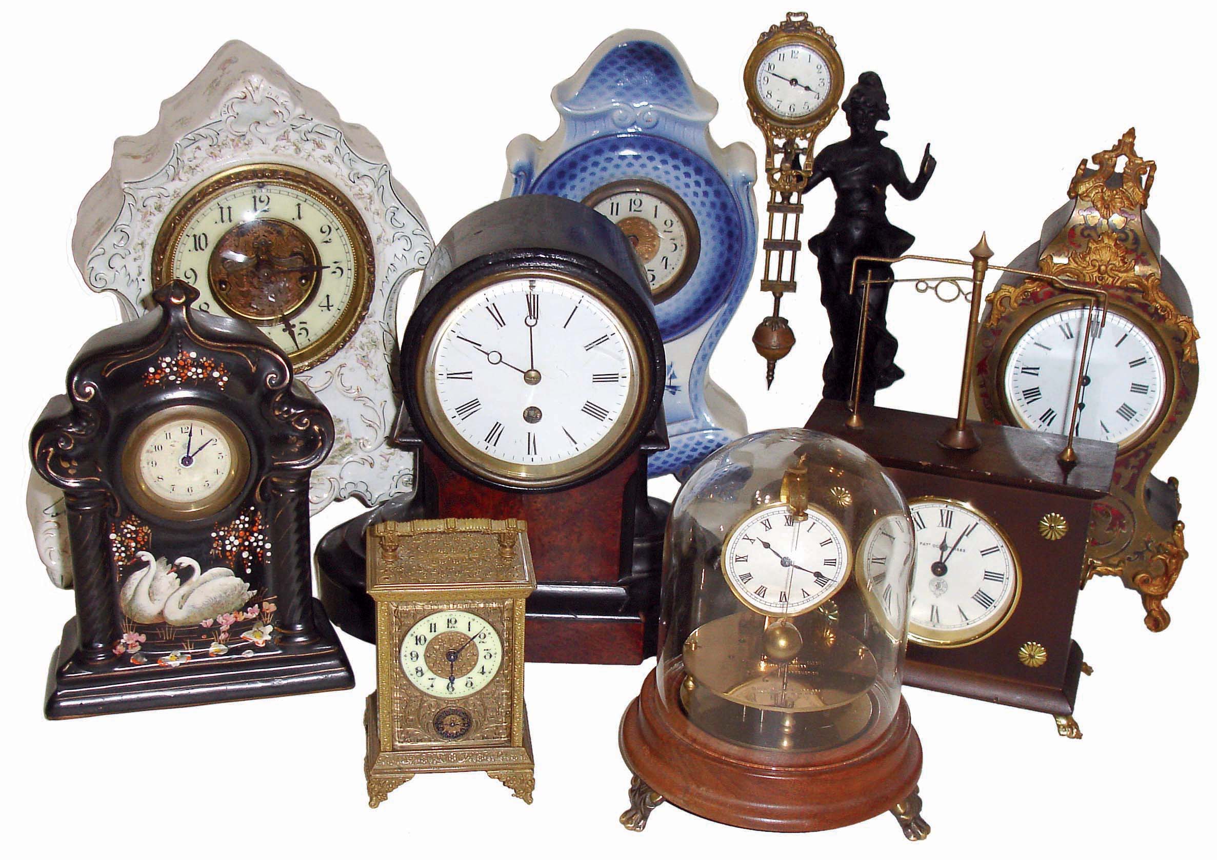Clocks- 9 (Nine) Novelty, Porcelain, Swinger, Carriage, Mantel: includes Horolovar flying ball and Briggs rotary; modern figural swinger (Asian); 3 porcelain including Waterbury with visible escapement; French time &amp; alarm carriage clock; and small French mantels; early and later 20th century — Antique Clocks Price Guide