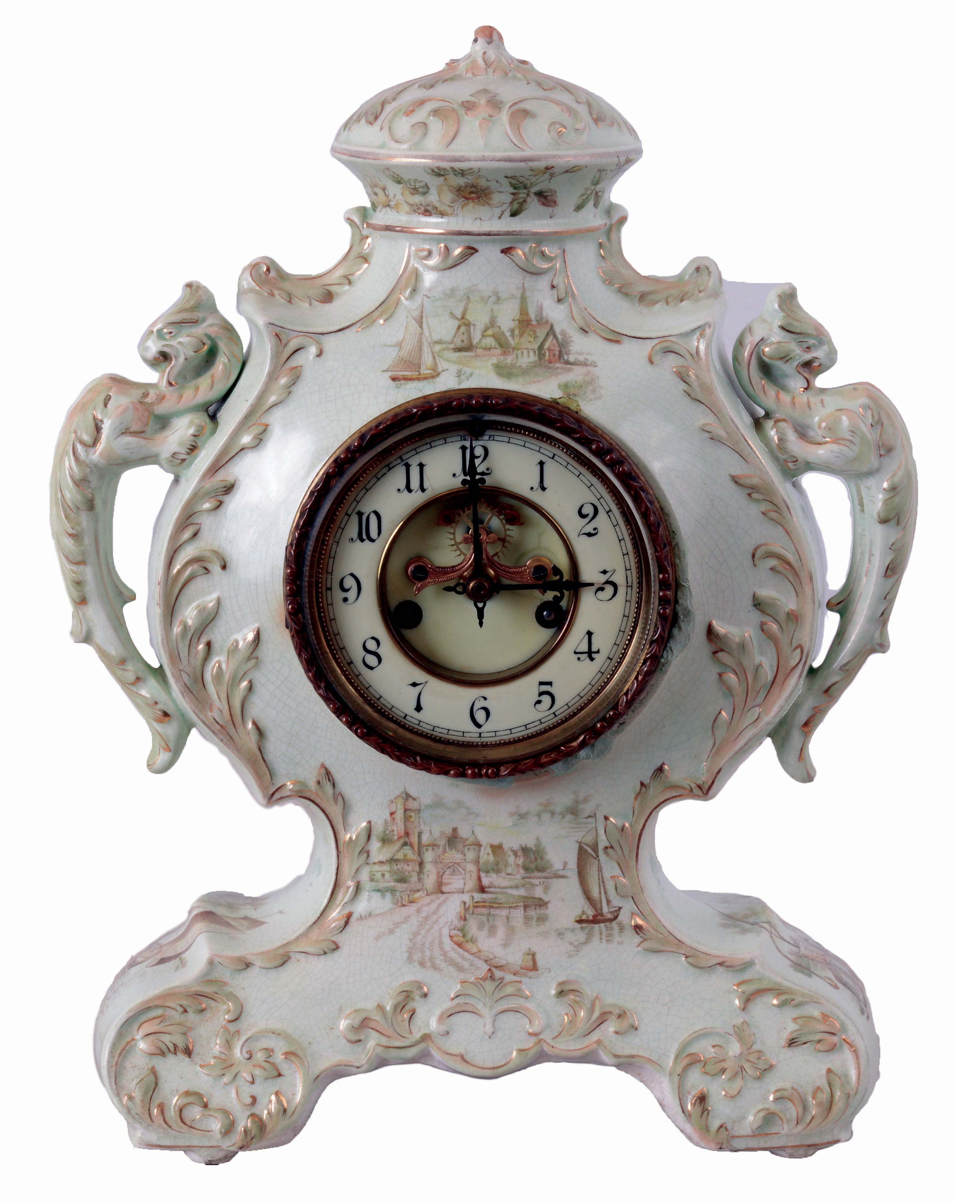 Waterbury Clock Co., Waterbury, Conn., "Parlor No. 44" porcelain shelf clock with a visible escapement spring driven, 8 days, time and hour/half-hour strike movement, c1897. — Antique Clocks Price Guide