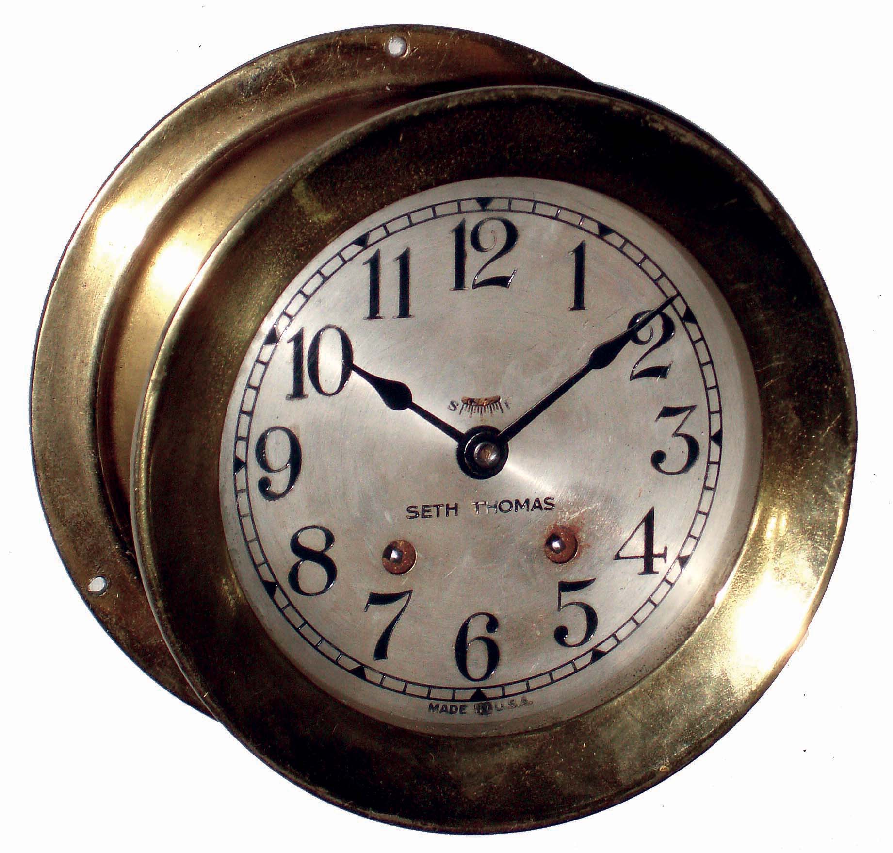 Seth Thomas Clock Co., Thomaston, Conn., "Ship's Bell No. 6" time and ship's bells strike, brass case, 5 1/2" dial, screw bezel marine wall clock, c1948 — Antique Clocks Price Guide
