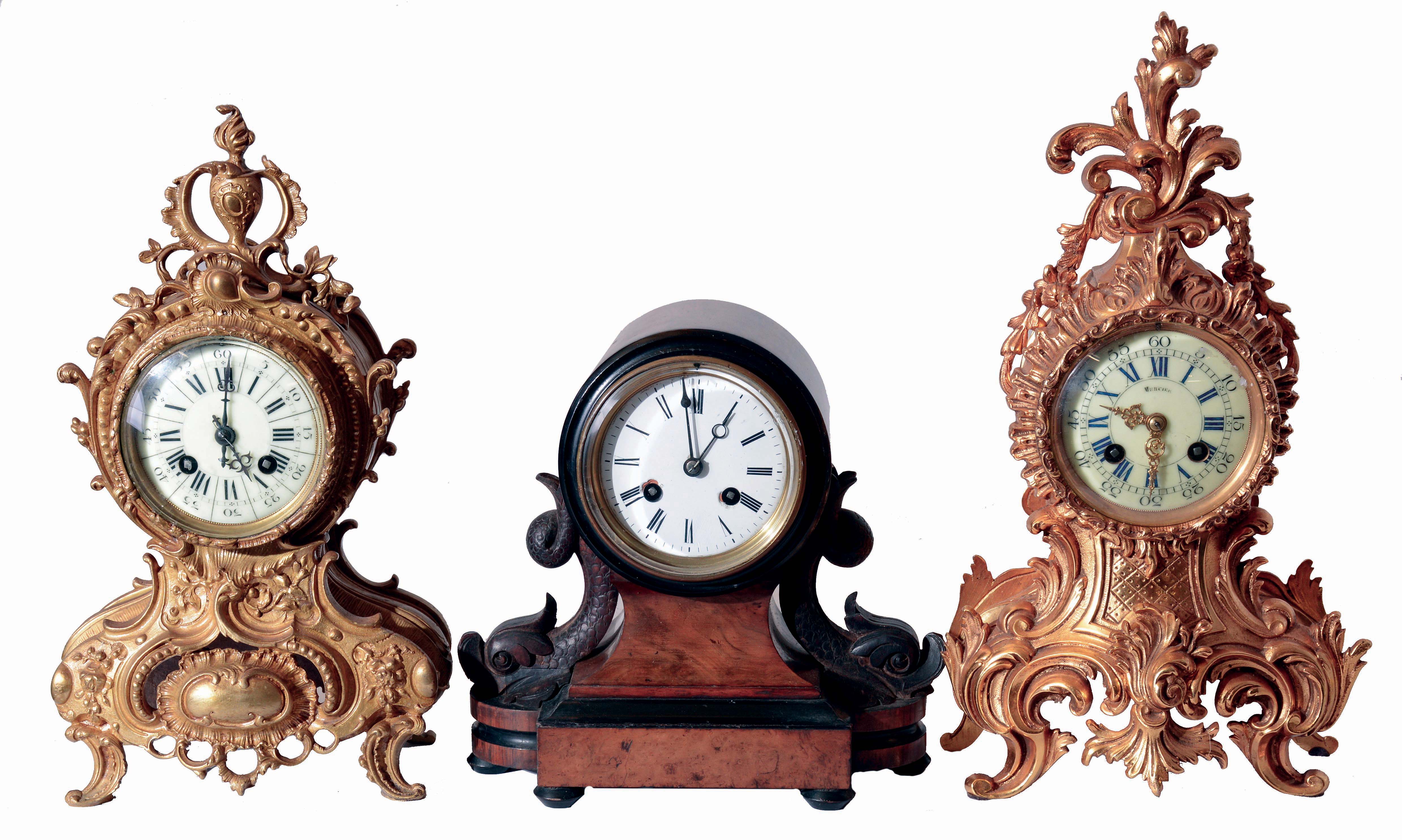 Clocks- 3 (Three): (1) French, A.D. Mougin, 8 days, time and strike, spring driven brass movement mantel clock. (2) French, Marti &amp; Cie, 8 days, time and strike, spring driven brass movement mantel clock. (3) French, Japy Freres, 8 days, time and strike, spring driven brass movement mantel clock. — Antique Clocks Price Guide