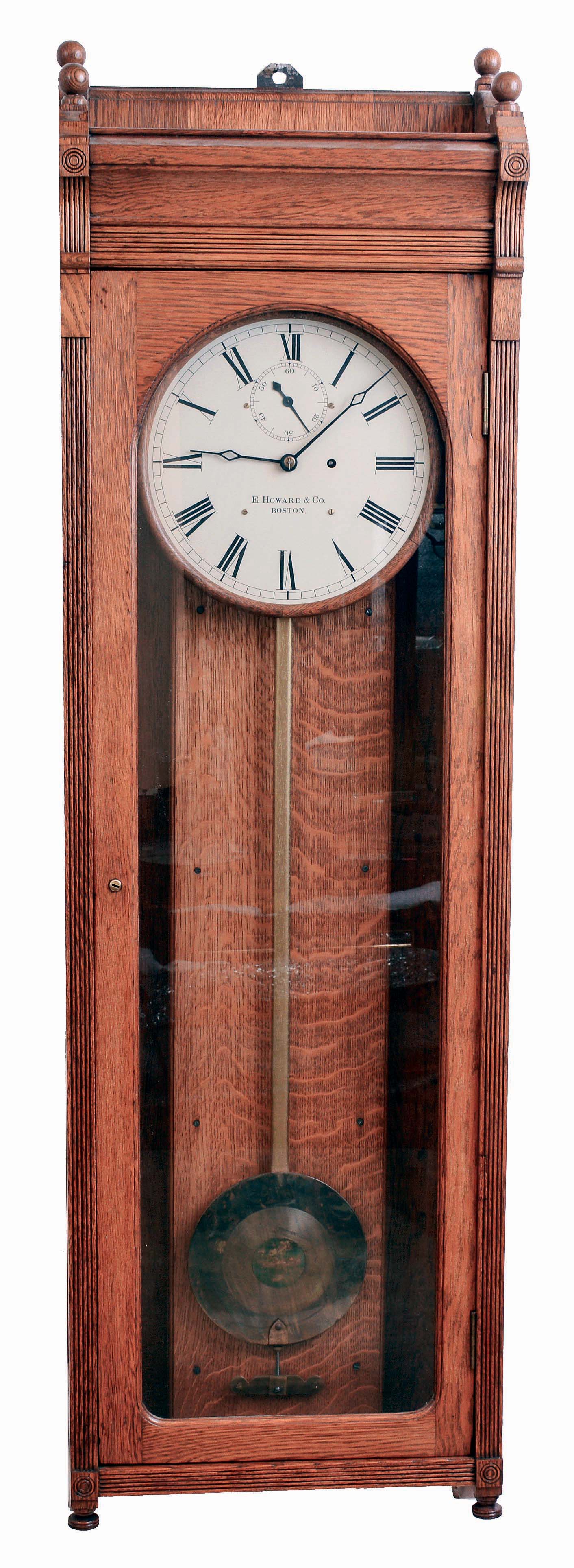 E. Howard &amp; Co., Boston, Mass., "No. 89 Regulator", wall clock, 8 days, time only, weight driven movement in an oak case with painted metal dial, c1890 — Antique Clocks Price Guide
