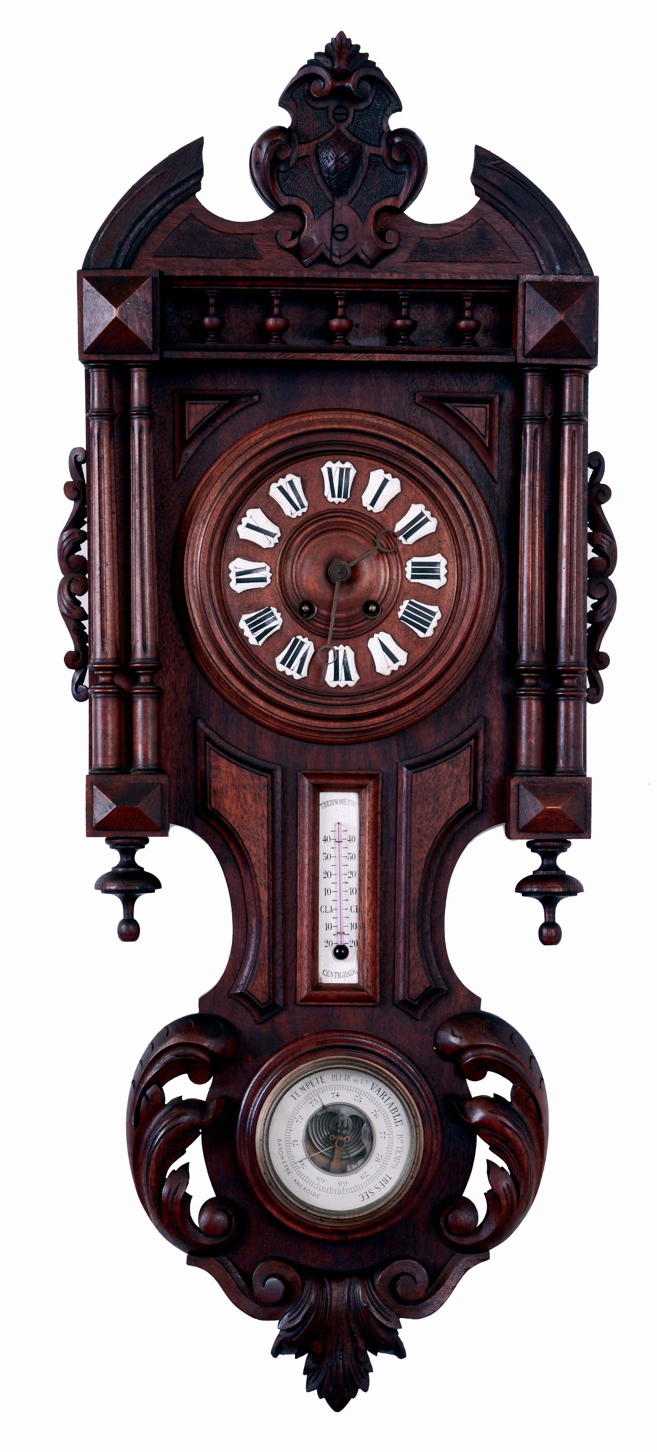 Clocks- 2 (Two): A French wall clock, carved wooden case with cast brass ornament in the rococo style, Roman numeral white enamel dial, 8 days timepiece movement, and a German wall clock, carved walnut case, wooden dial with Roman numeral enamel cartouches, 8 days time and strike movement, with thermometer and barometer, both c1900 — Antique Clocks Price Guide