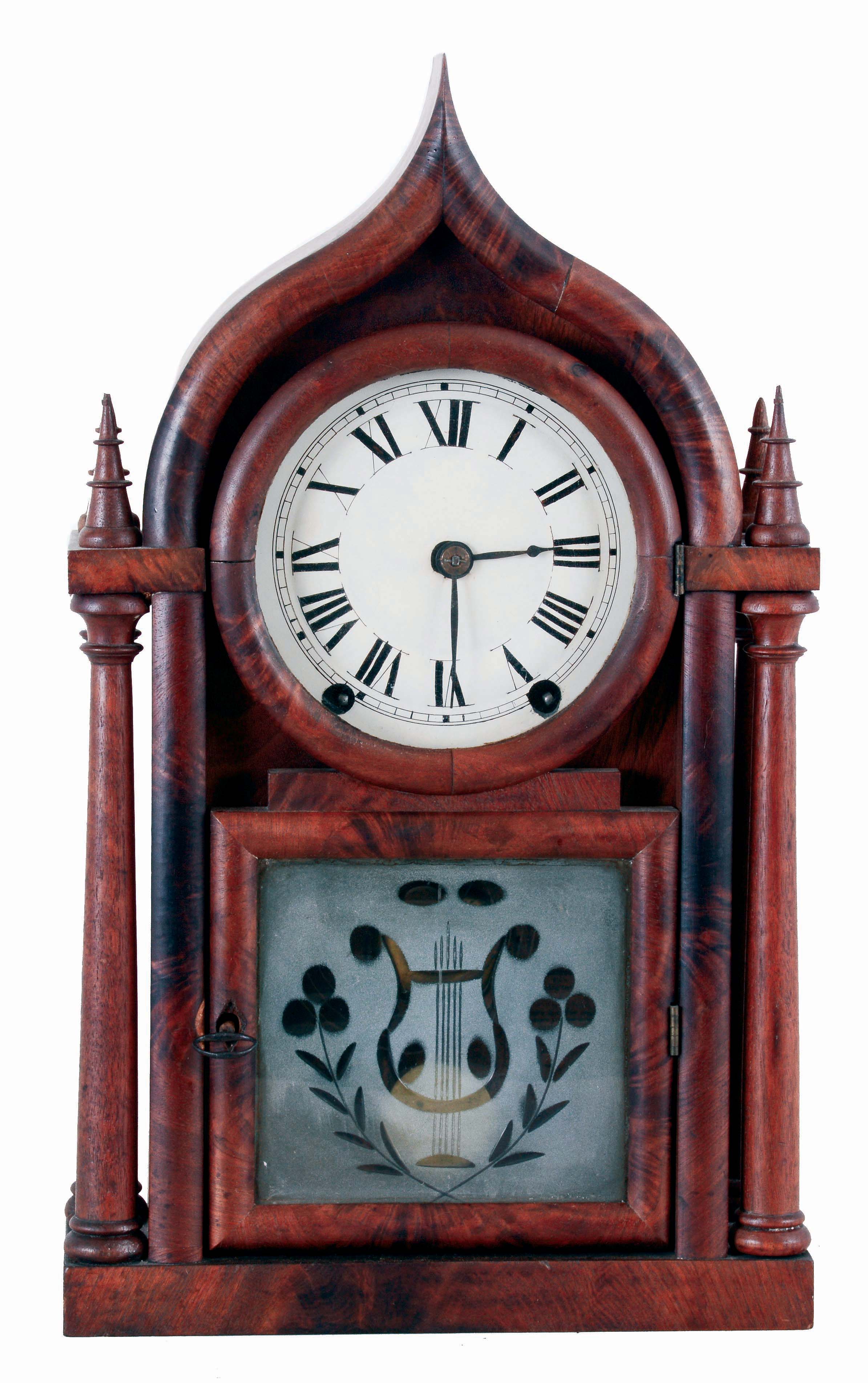 Brewster &amp; Ingrahams, Bristol. Conn., 4 Column Ogee Gothic mahogany shelf clock with 8 days, brass spring driven movement with rack and snail strike, c1848, — Antique Clocks Price Guide