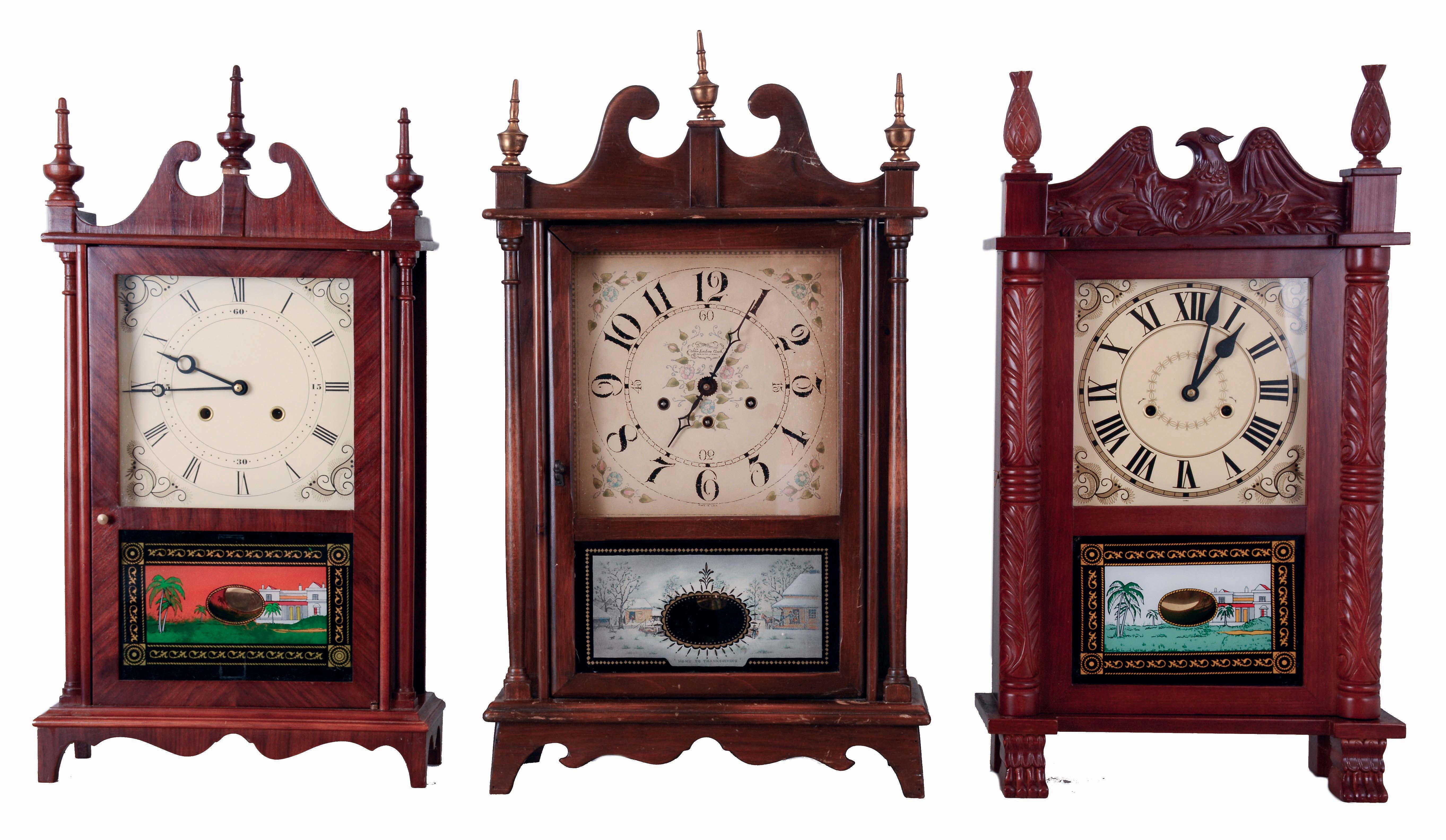 Clocks- 4 (Four): Daniel Pratt Jr., Reading, Mass., 30 hours, time, strike and alarm "groaner"-style wooden works, weight driven movement in a half column and scroll case, c1835; plus three 20th century reproductions- two pillar and scrolls (one New England Clock Co.) and one Asian carved clock. — Antique Clocks Price Guide