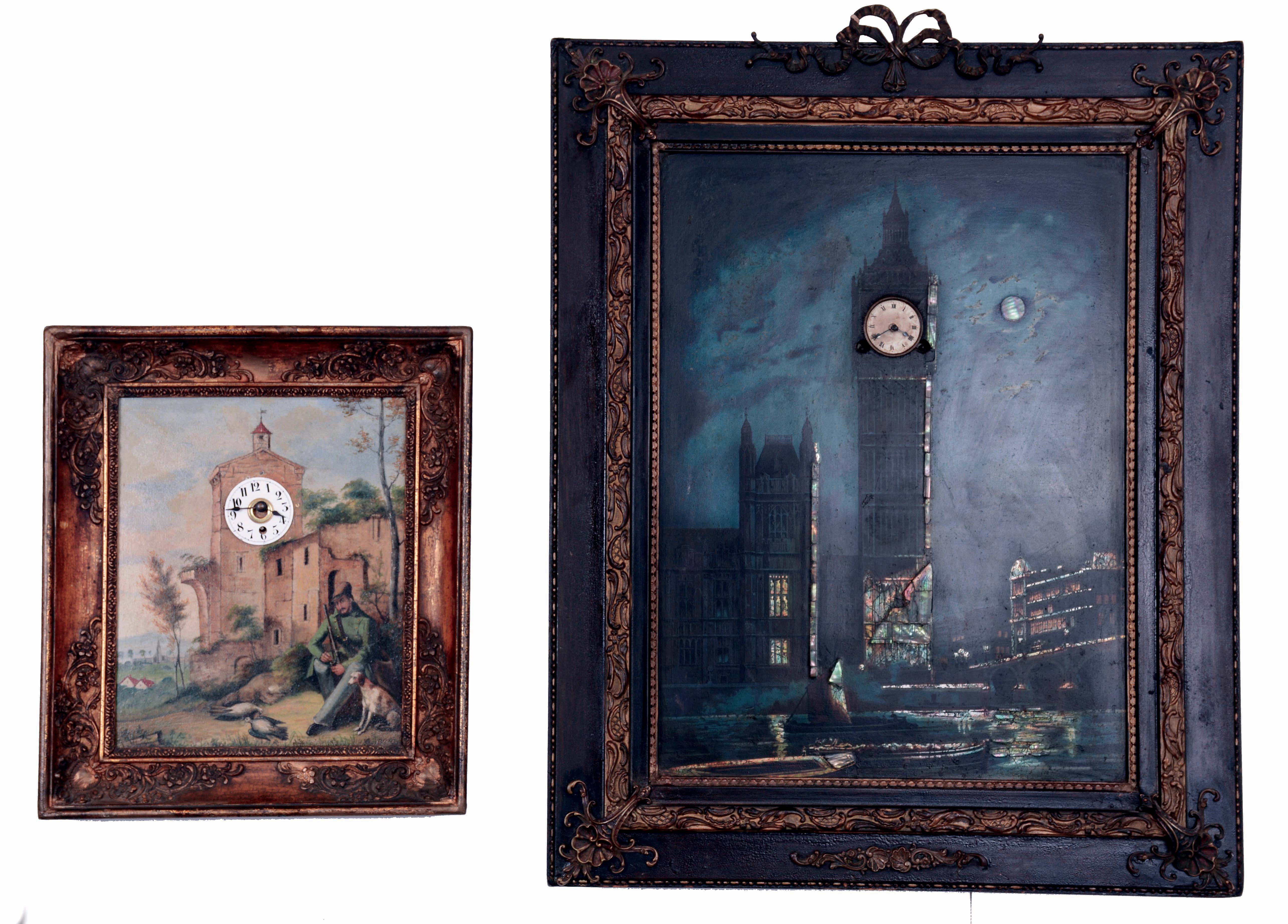 Clocks- 2 (Two): Both picture frame, the first with oil on masonite with mother of pearl inlay, night scene of Big Ben and boats on the Thames, with 8 days, brass quarter striking movement with lever escapement, a music box sounding the first three quarters of Westminster, and playing There's No Place Like Home" at the hour, in a dark oak frame with gilt ornament, c1900, the other with oil on sheet iron of a castle in a landscape, with a hunter and his dog in the foreground, 30 hours time only movement, in a gilt frame with gesso ornament, c1870 — Antique Clocks Price Guide