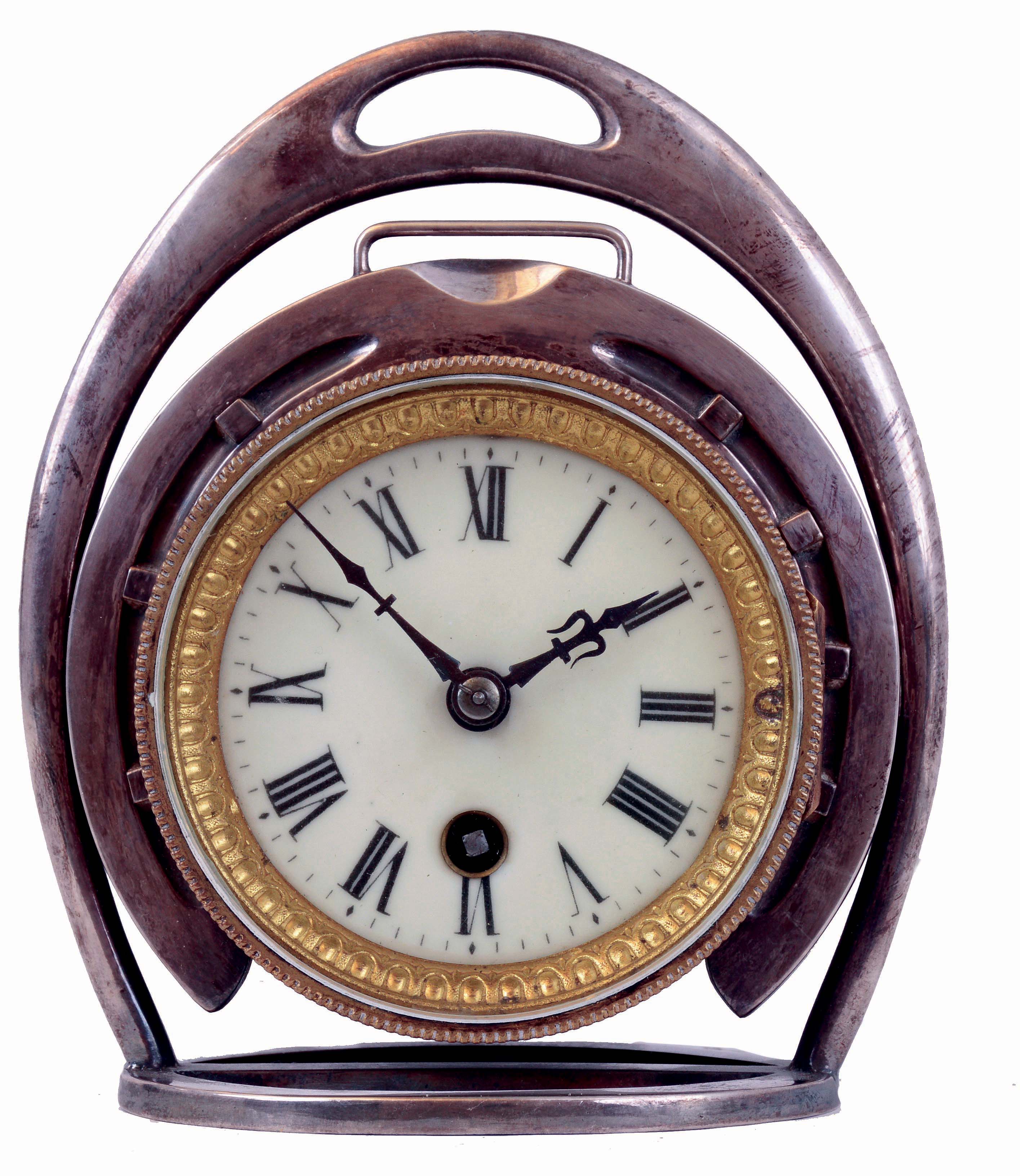 Ansonia Clock Co., New York, NY, "Novelty No. 18", horseshoe desk timepiece, silver plated case with horseshoe dial surround, Roman numeral white enamel dial, 8 days timepiece movement with cylinder platform, c1890. — Antique Clocks Price Guide