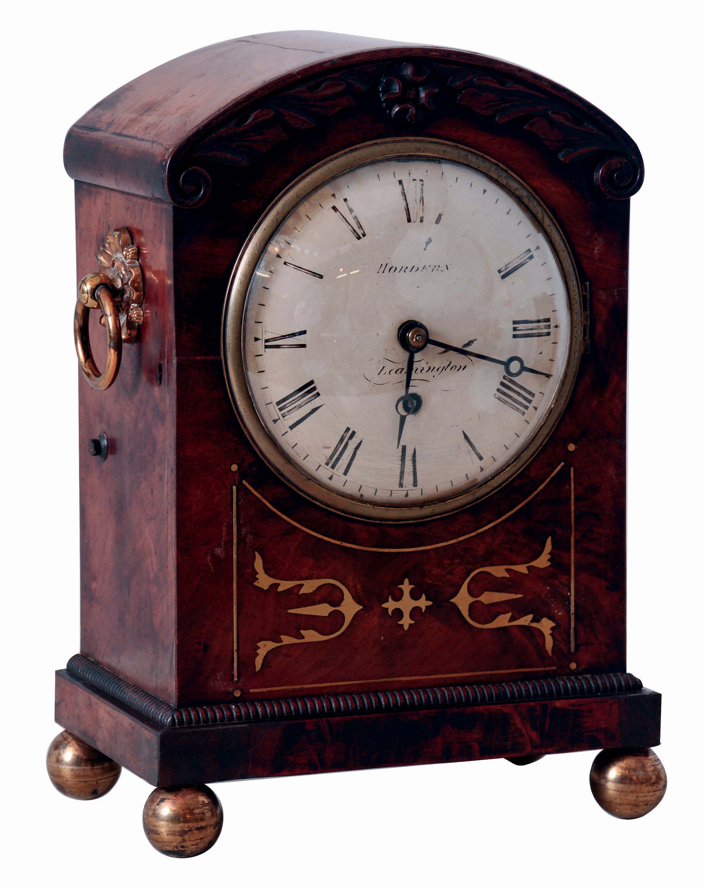 Hordern, Leamington, England, bracket clock in the Regency style, oak case with figured mahogany veneer, brass inlay and applied carved ornament, brass ball feet and carrying handles, brass bezel with convex glass, Roman numeral white painted sheet iron dial, 8 days, fusee timepiece movement, c1835 — Antique Clocks Price Guide