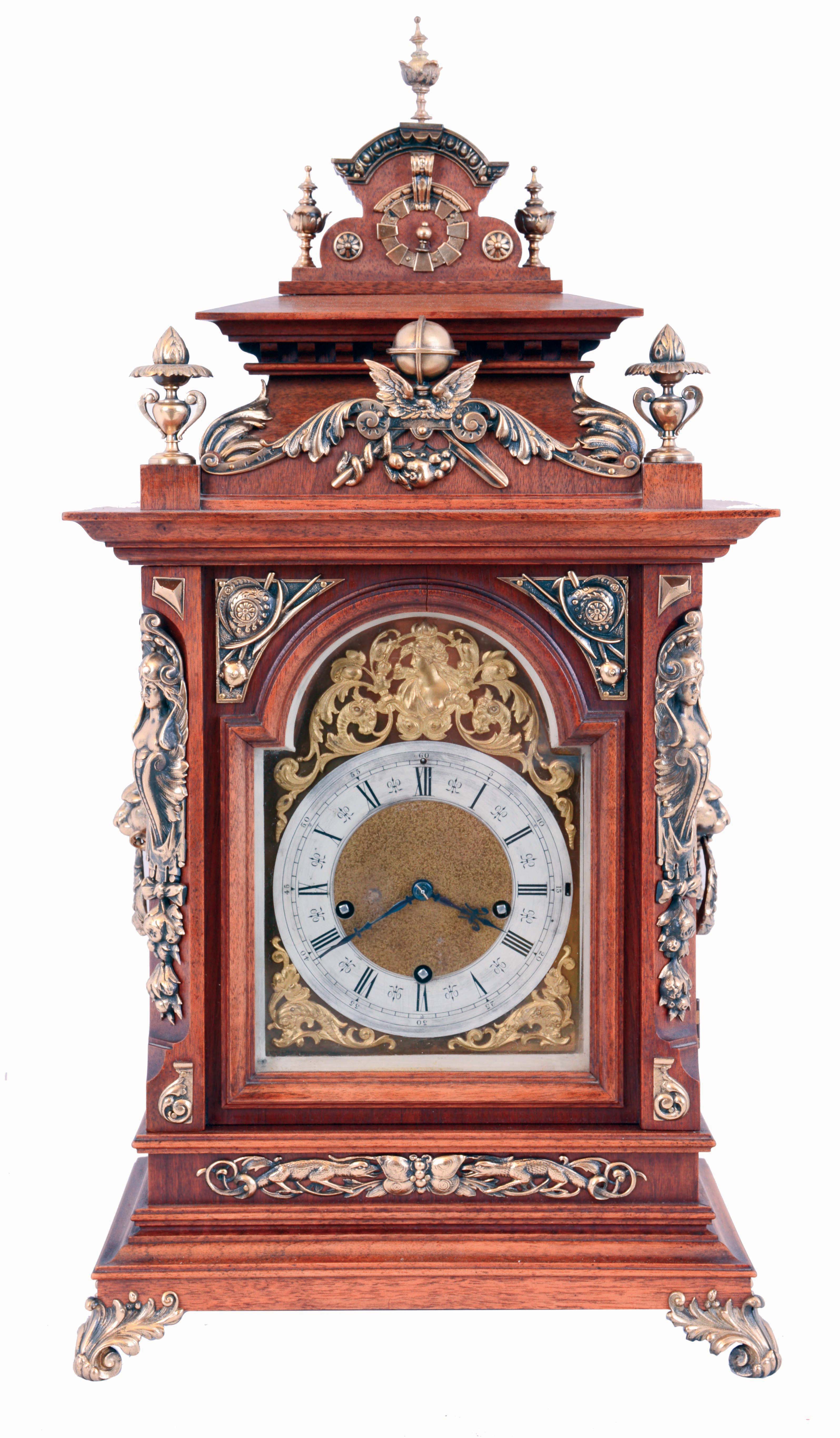 Lenzkirch, Germany, bracket clock, walnut case mounted with extremely ornate brass castings, including salamanders, half caryatids, lion mask handles, and more, composite dial with applied, art nouveau inspired gilt ornament, Roman numeral, silvered chapter ring, blued steel hands, 8 days, three train repeating movement, striking ting tang quarters on gongs, serial #950914, c1895 — Antique Clocks Price Guide
