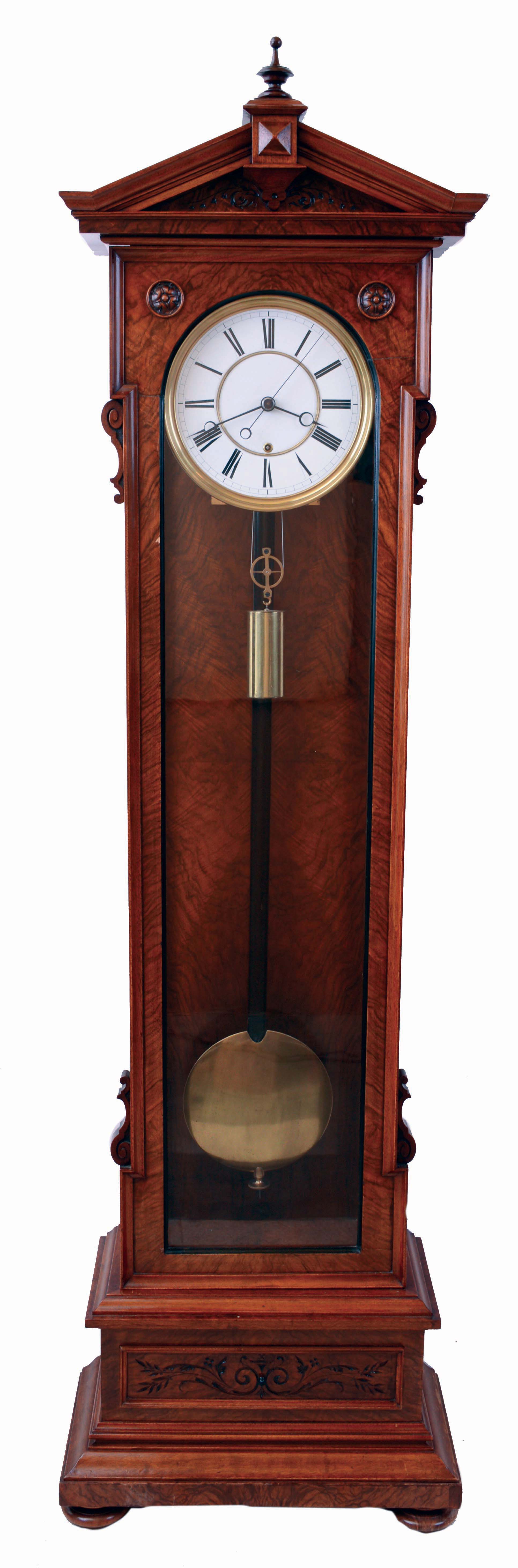 Lenzkirch, Germany, standing regulator, model 478, walnut and matched walnut veneer case of architectural form, ornamented with applied moldings, turned elements, and carving, and with a drawer in the base, and resting on turned feet, Roman numeral white enamel dial with brass bezel, blued steel Breguet style hands, and with center seconds hand, brass 8 day timepiece movement with deadbeat escapement and Vulliamy pallets, brass clad weight, ebonized pendulum rod with brass ball, serial #309868, c1875 — Antique Clocks Price Guide