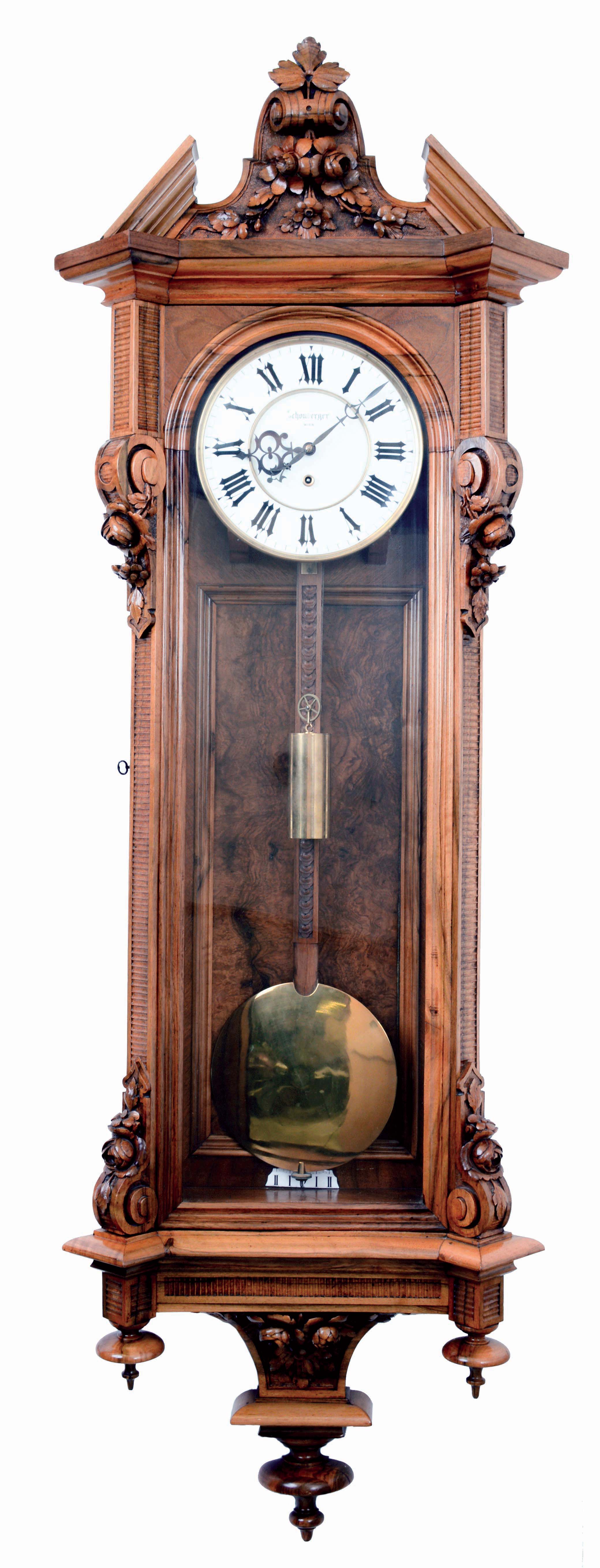 Austrian, Schonberger, large single weight 8 days timepiece with 9 inch dial (10" bezel), in a long, 66 beat case, the case of walnut solids and veneers, and with unusual carved pendulum stick, c1875 — Antique Clocks Price Guide