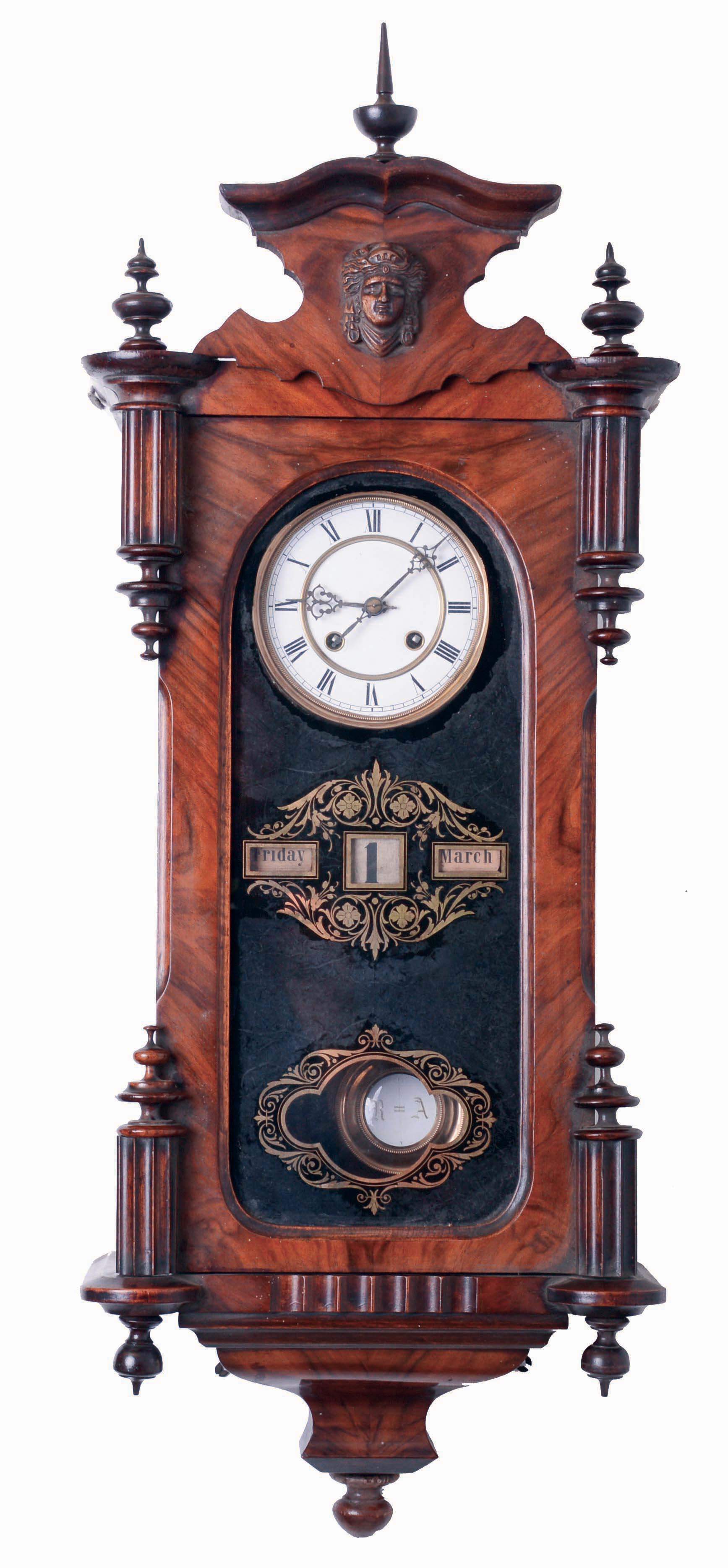 Germany, calendar wall clock, 8 days, time, strike and perpetual calendar, spring driven movement in a mahogany case with white enamel dial and reverse painted glass, c1870 — Antique Clocks Price Guide