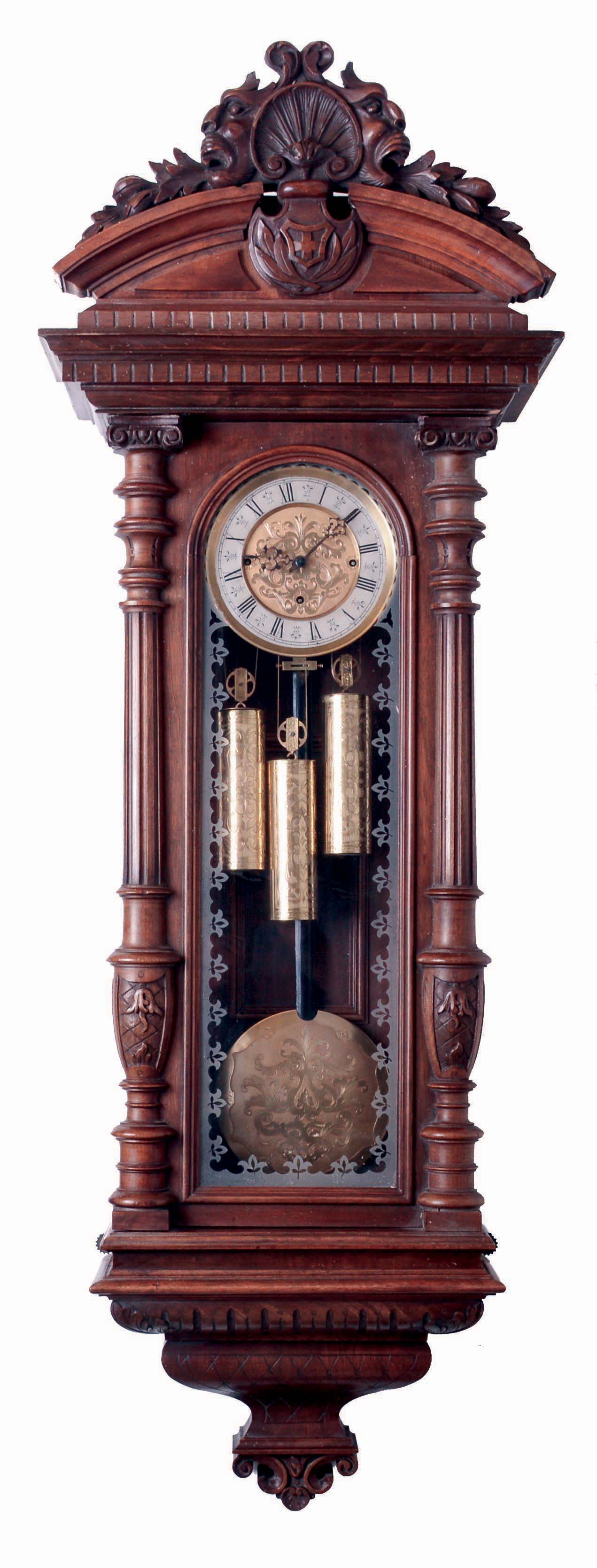 Vienna Regulator, Grande Sonnerie wall clock, 8 days, three weight driven movement in an Alt Deutsche style carved walnut case with engraved dial center, pendulum bob and brass weights, c1875 — Antique Clocks Price Guide