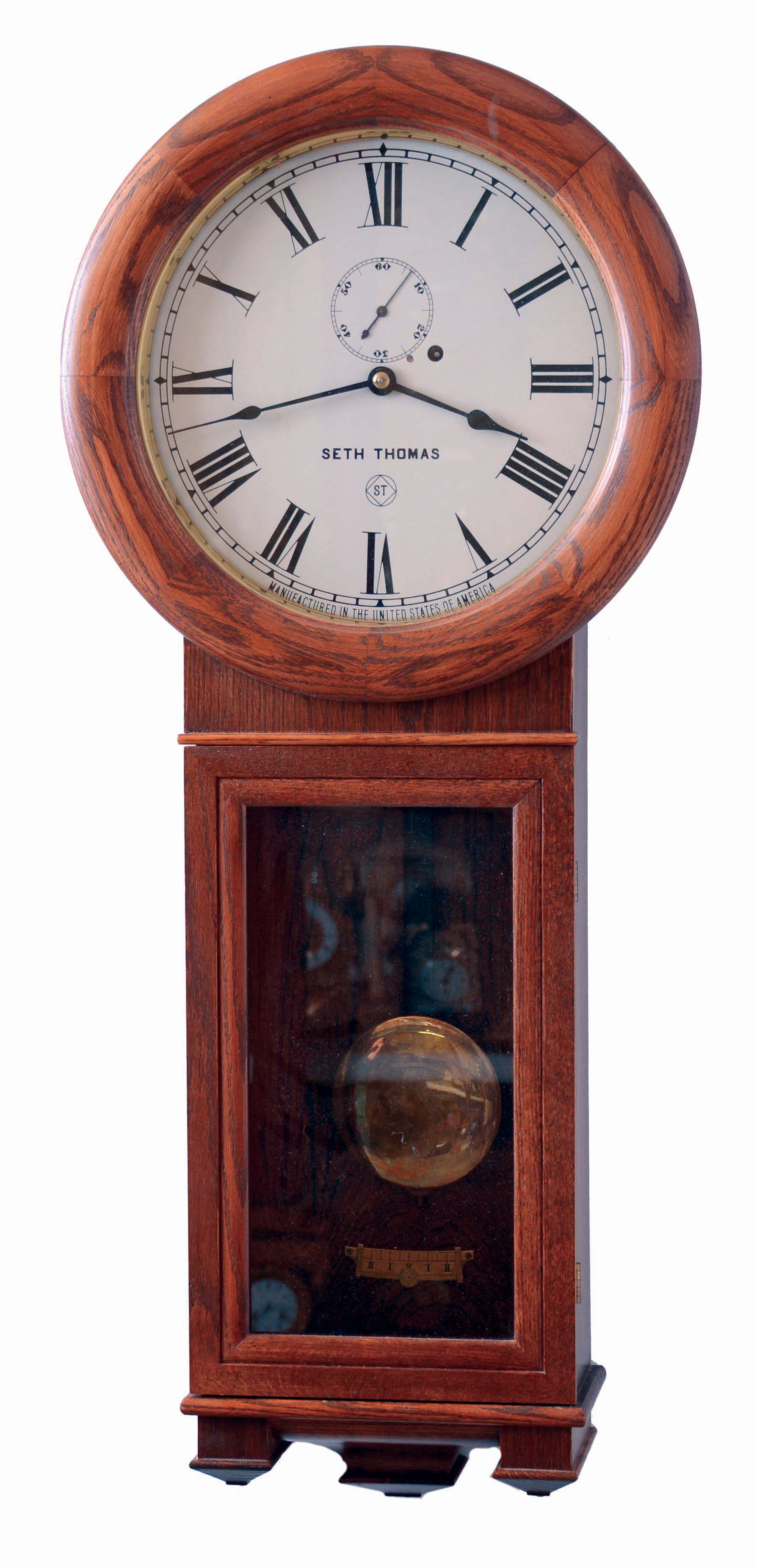 Clocks- 2 (Two) Seth Thomas oak, 8 days, wall clocks: "Regulator No.2" reissue weight driven timepiece; Asian reproduction time, strike and calendar long drop school clock; late 20th century — Antique Clocks Price Guide