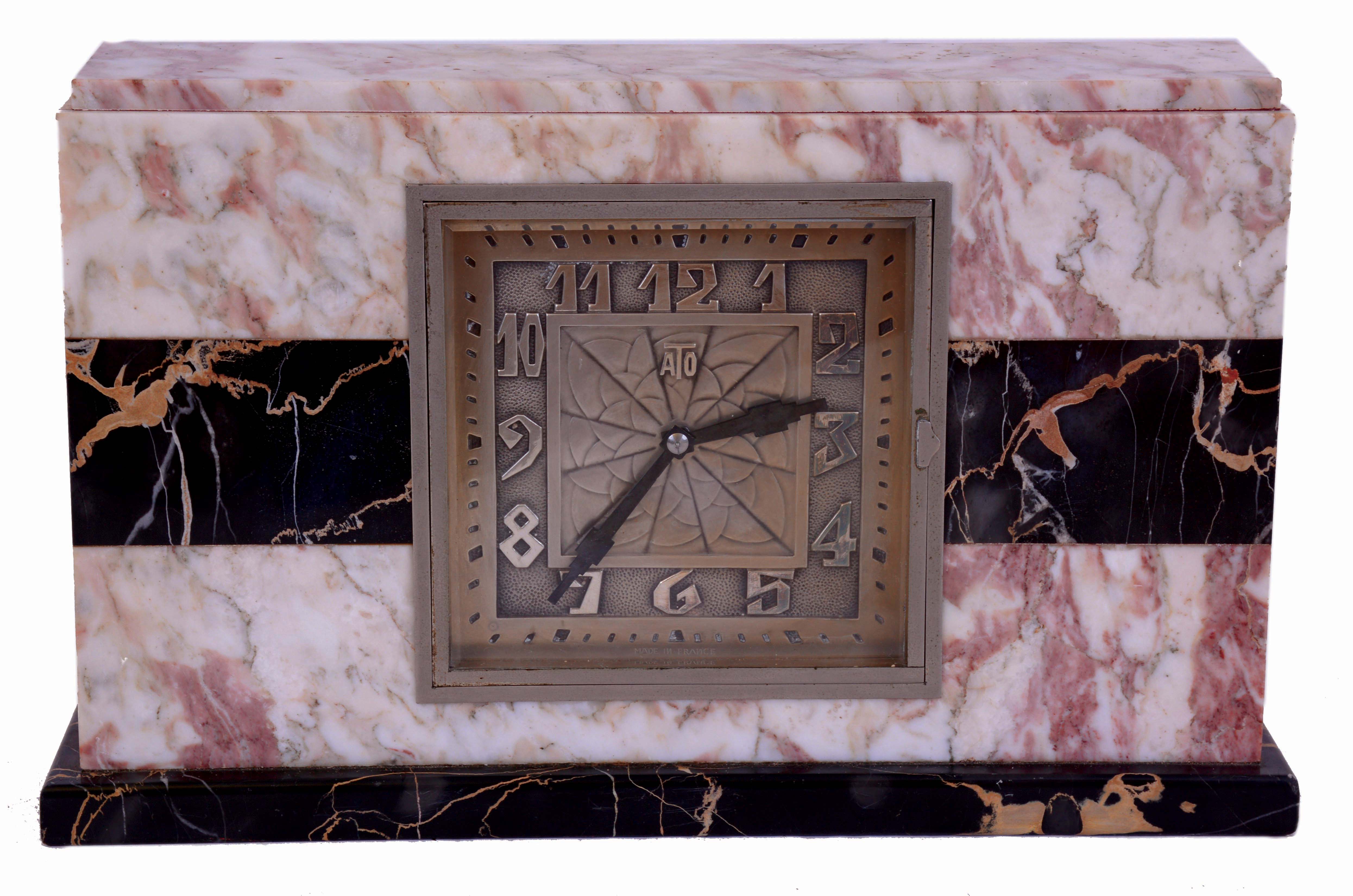 ATO, France, mantel clock, rectilinear Art Deco case constructed of Rosa Norvegia and Portoro marbles, square, Arabic numeral metal dial, steel hands, brass movement marked in part "Leon Hatot Fabricants Paris", c1930 — Antique Clocks Price Guide