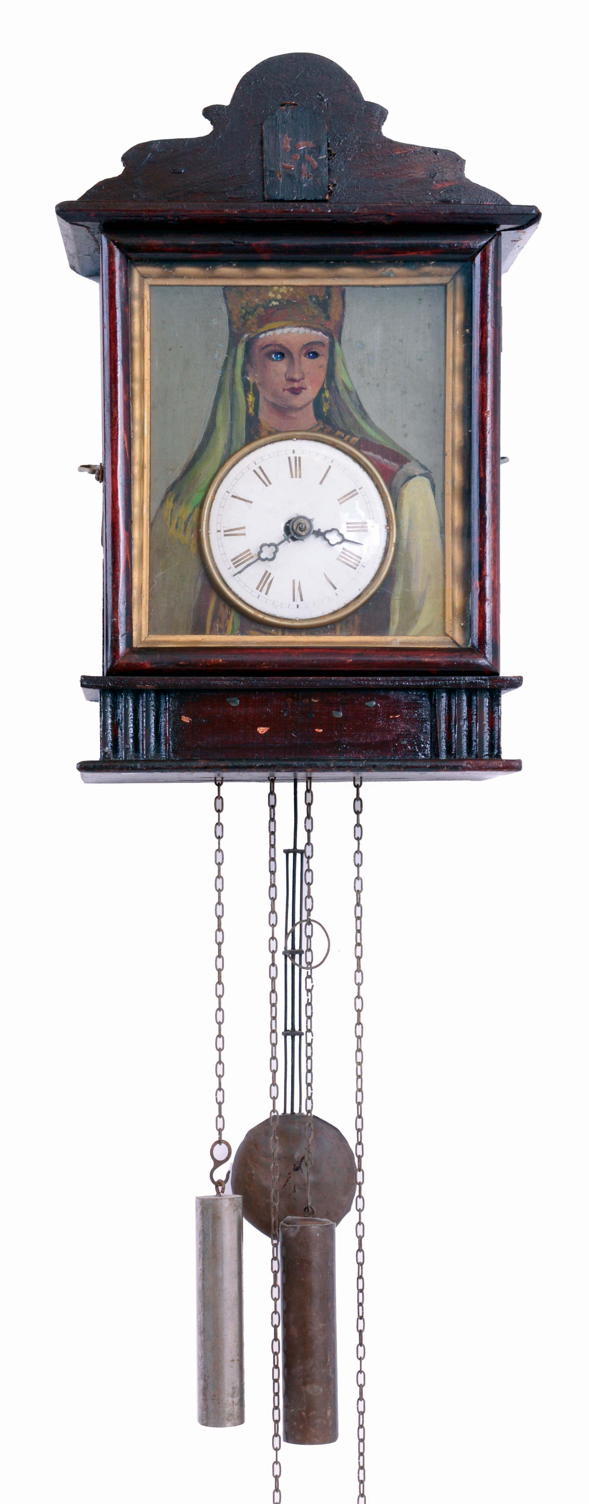Eastern European or German, architectural cuckoo, a painting of a gypsy with the clock in her belly, and her eyes moving from side to side as the clock runs, c1900 — Antique Clocks Price Guide