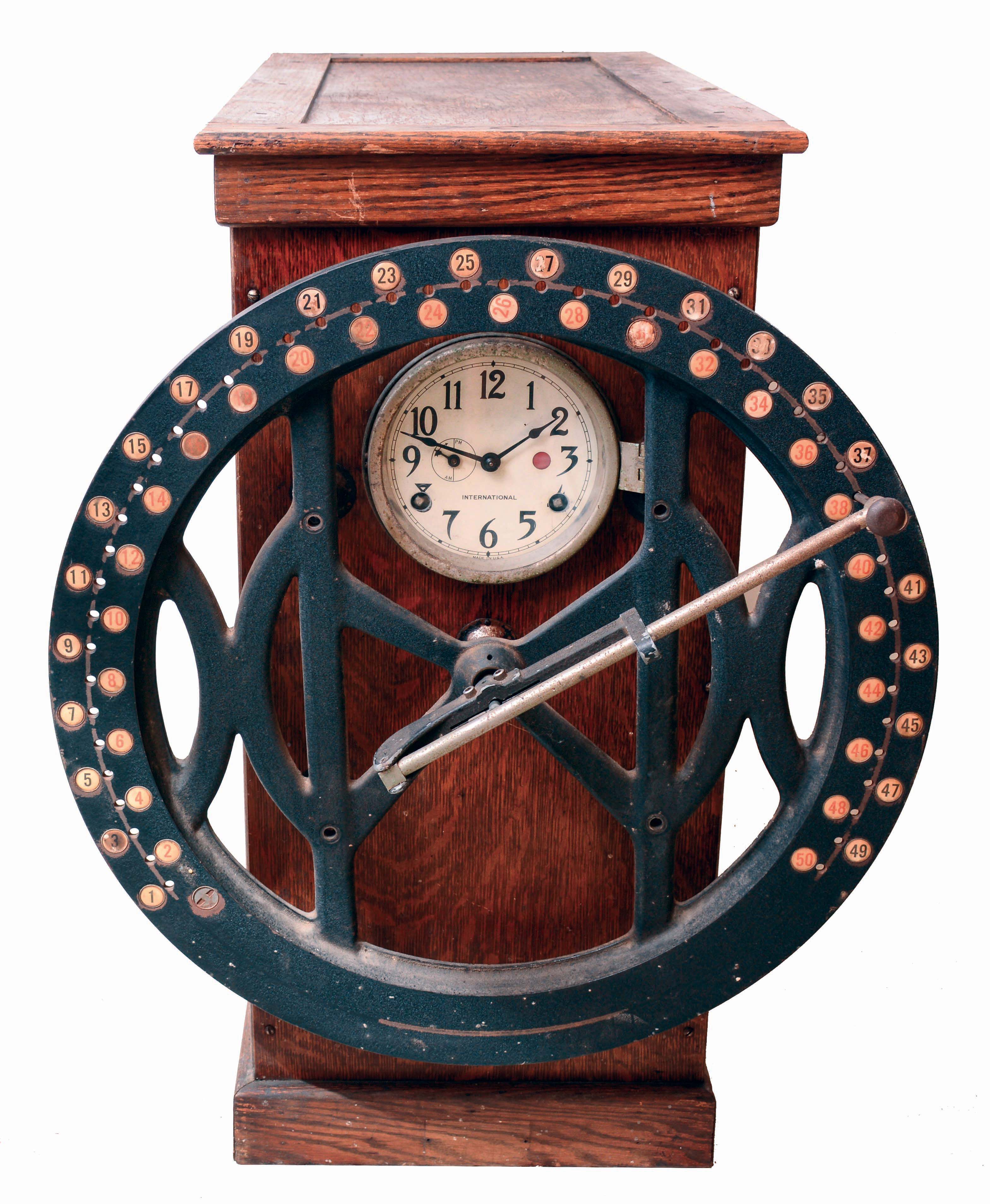 International Time Recording Co., Endicott, New York, 8 days duration time punch clock for 100 employees in a table model oak case, c1910 — Antique Clocks Price Guide