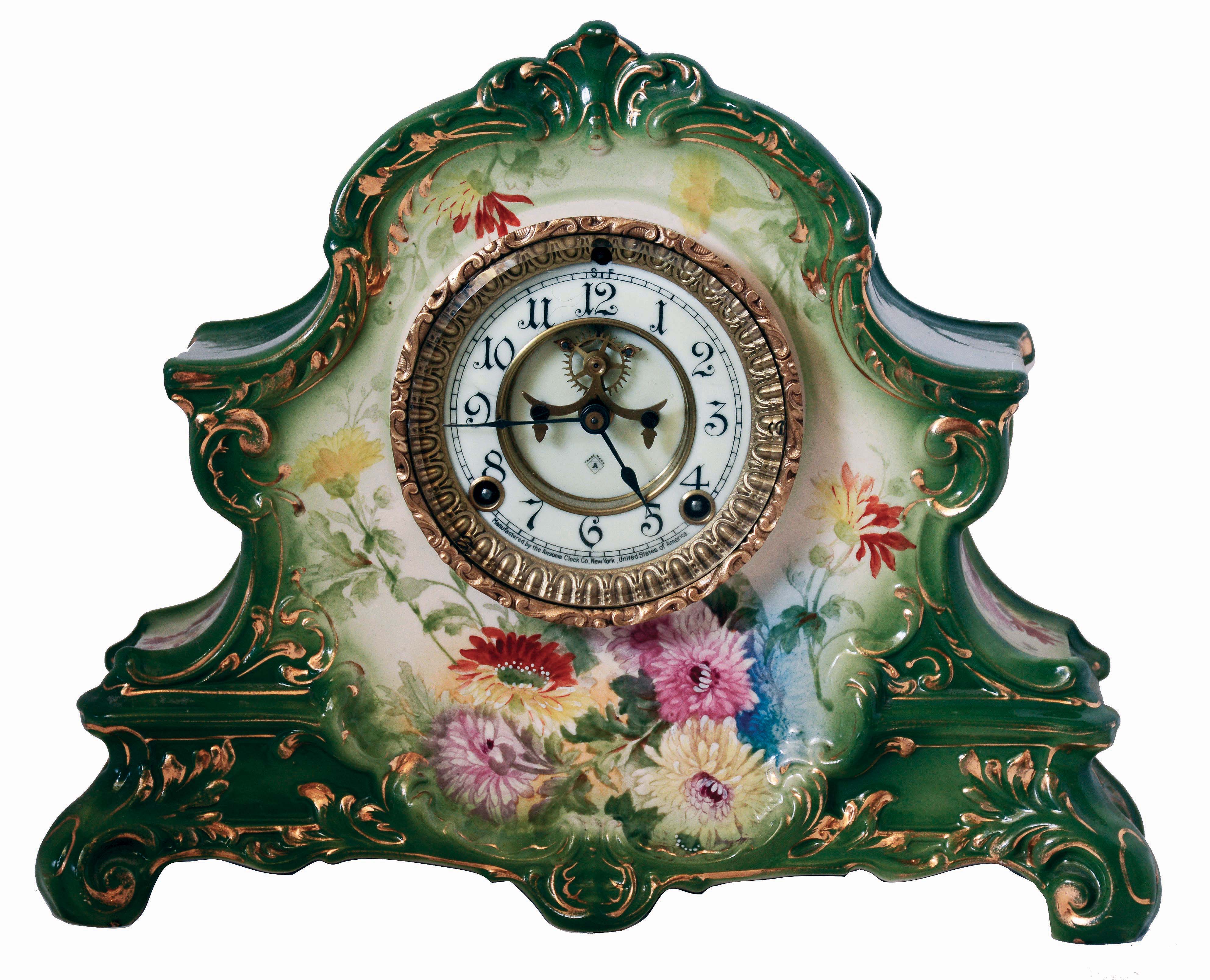 Ansonia Clock Co., New York, NY, "La Nord" porcelain shelf clock in a Royal Bonn case with a spring driven, 8 days, time and hour/half-hour strike movement with visible escapement, c1904. — Antique Clocks Price Guide