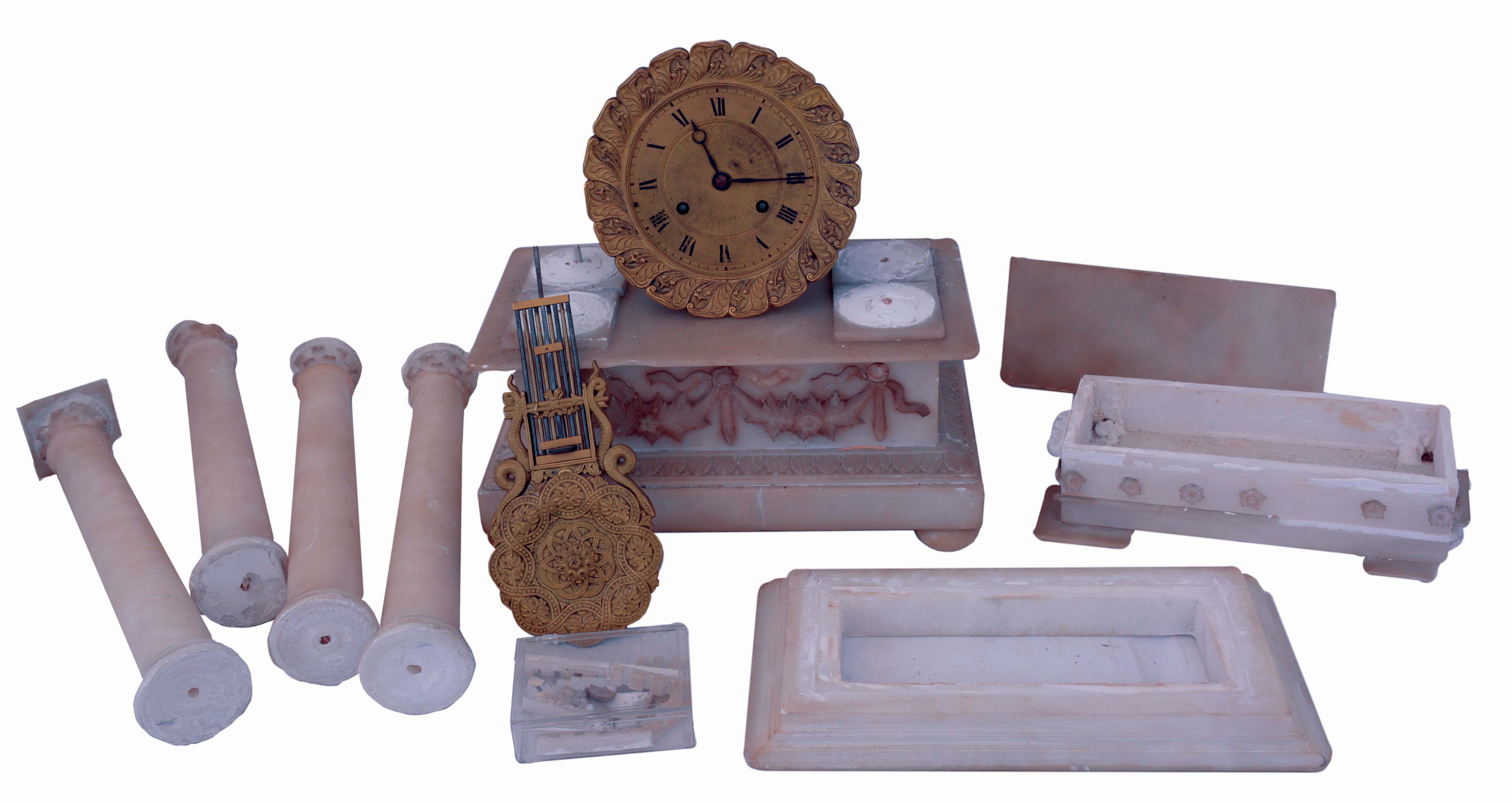 France, portico clock, the alabaster case with applied, carved ornament, columns with carved capitals, gilt brass bezel and dial, ornate gridiron style pendulum, 8 days, time and strike movement, c1830 — Antique Clocks Price Guide
