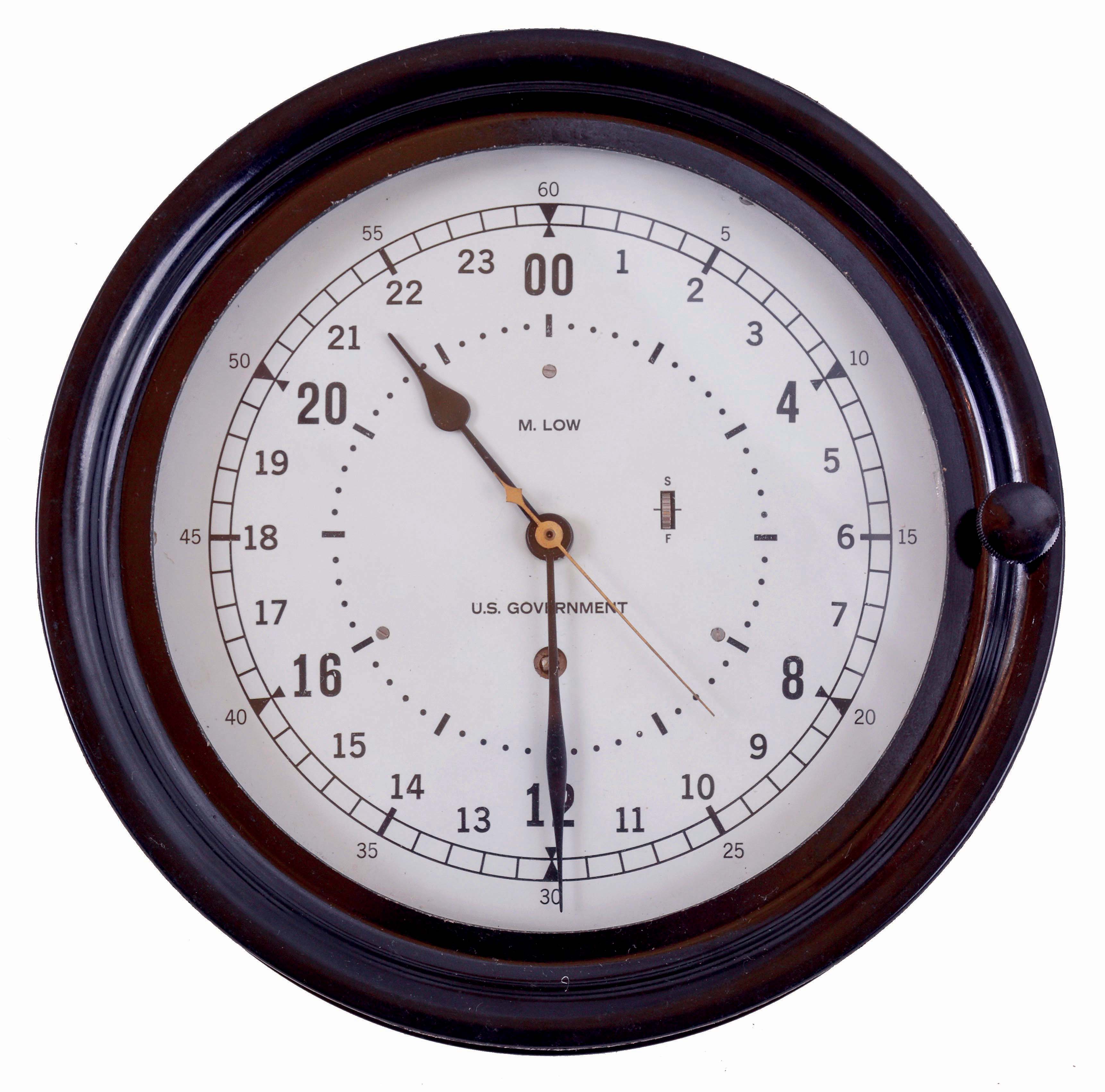 Chelsea Clock Co., Boston, Mass., 8 days, brass spring lever movement deck or engine room timepiece. Dial is marked: "M. Low, New York" on the case back and the movement that looks to be nickel plated. serial #931969 — Antique Clocks Price Guide