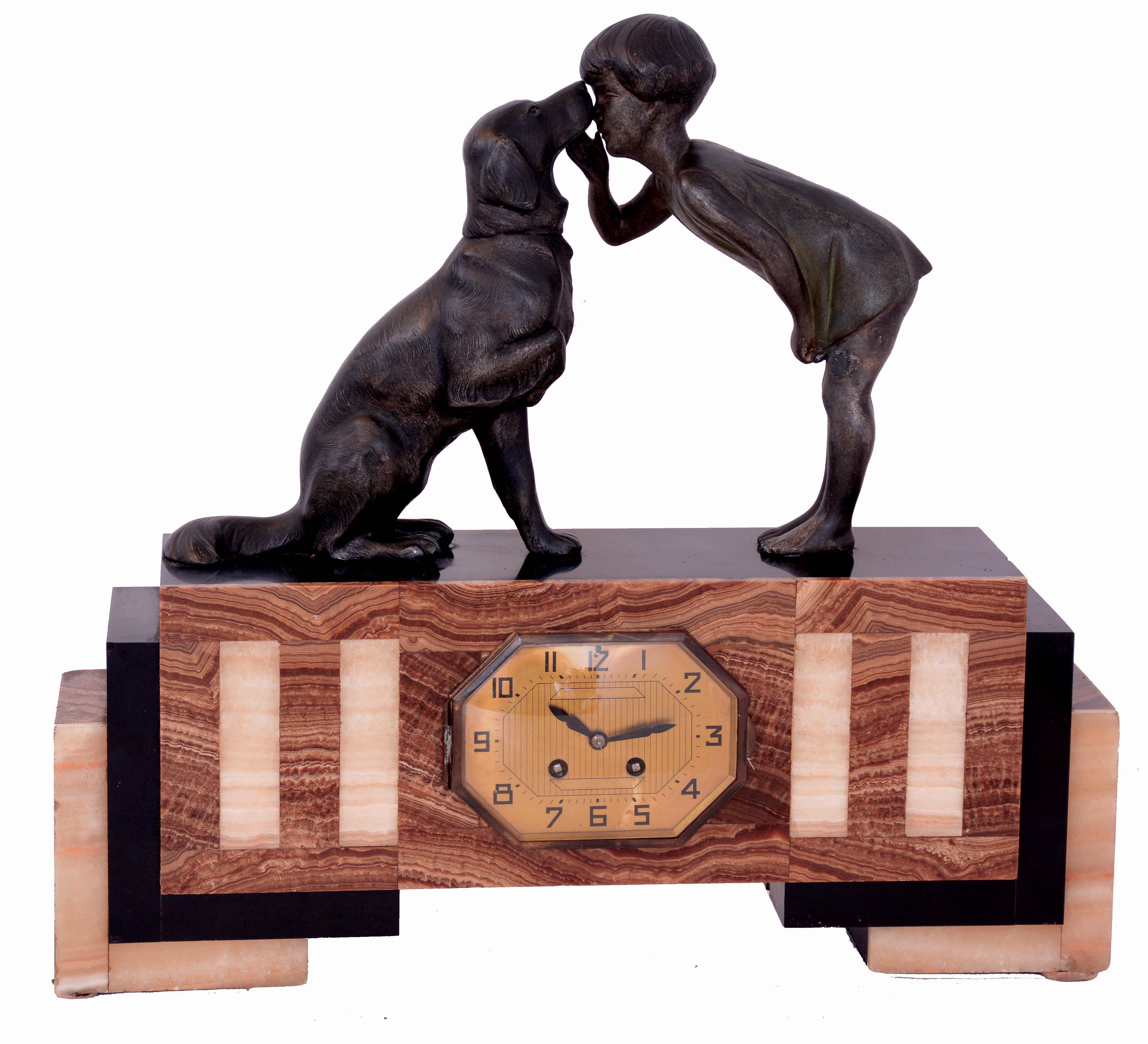 French Art Deco marble and petrified wood (?), 8 days, time and strike mantel clock with girl and dog bronzed spelter top figures, Marti movement with count wheel striking, c1925 — Antique Clocks Price Guide