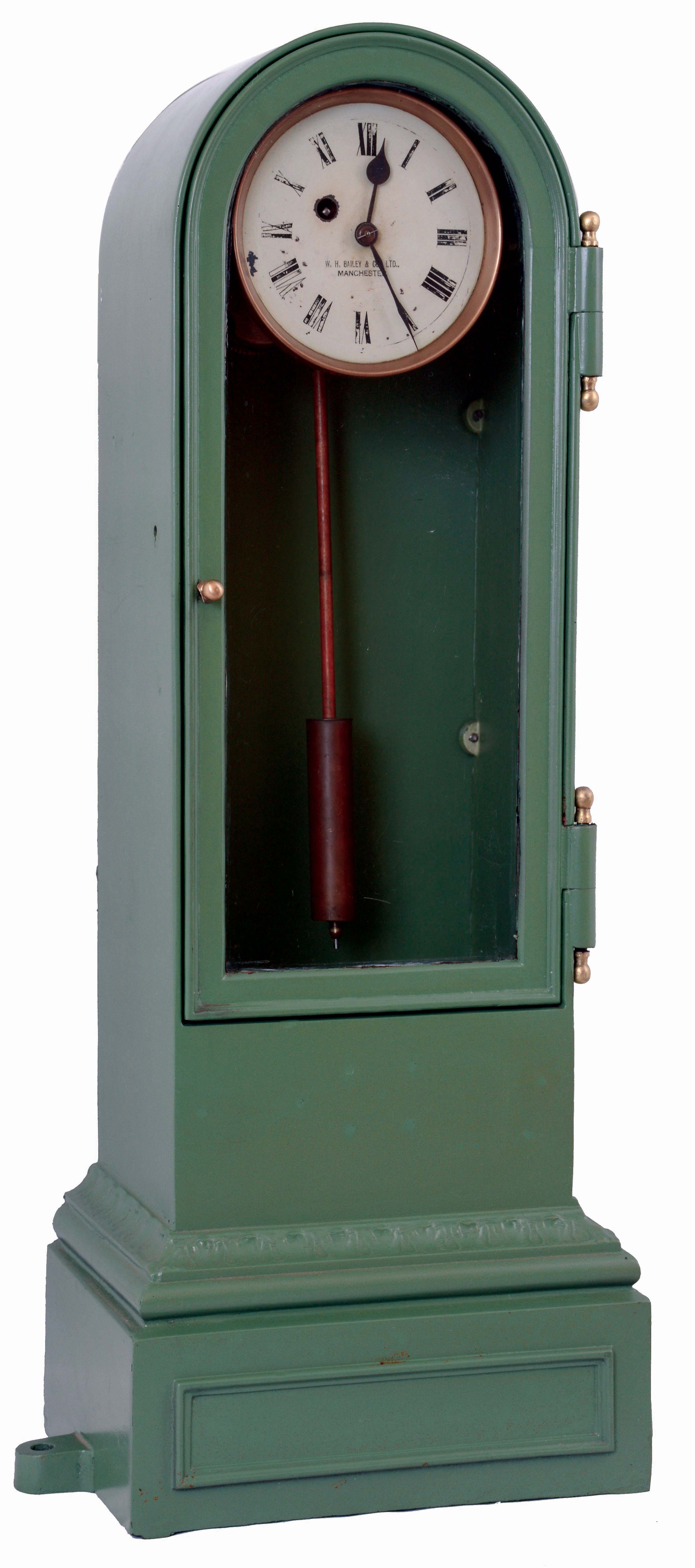 W. H. Bailey &amp; Co., Ltd., Manchester, England, factory clock with cast iron domed top case, glazed front door with huge hinges, molded base, each side of the base with provision for bolting the clock to the floor, and Roman numeral white painted dial, blued steel spade and poker hands, 8 days fusee timepiece movement with cylindrical brass pendulum, c1900 — Antique Clocks Price Guide
