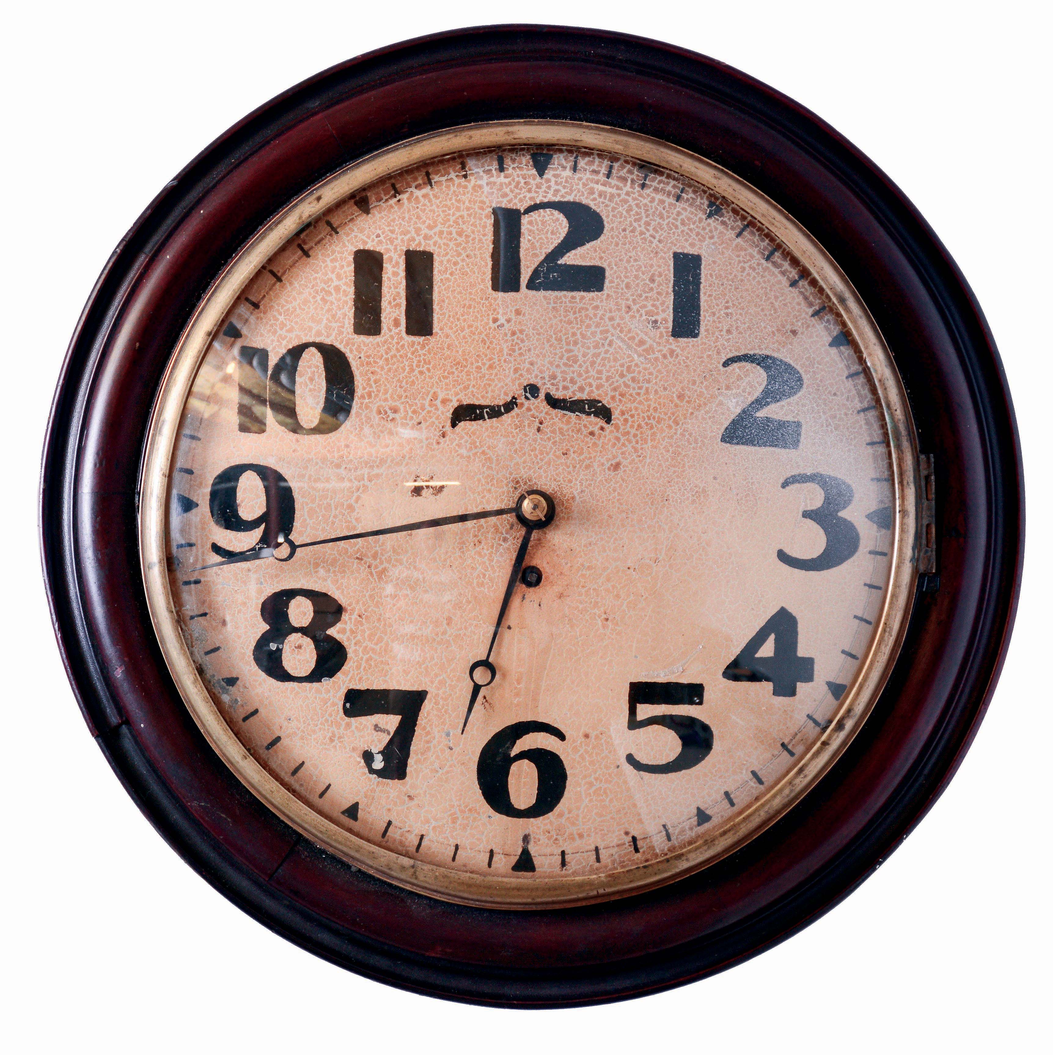 Wood, Montreal, "16" A Frame Fusee Gallery Clock", round 16 inch gallery clock that was retailed by Wood of Montreal in the 1860 era, and was probably made in England. The clock is signed on the fusee movement Wood and Montreal. This movement is a typical English 'A' frame movement with the original fusee type pendulum. It is a name that we have seen before on clocks of this period in Canada. The mahogany and mahogany veneer case was probably made in Canada. The front opens with hinges on the side and locks with a latch as opposed to using bars and wood taper pins. — Antique Clocks Price Guide