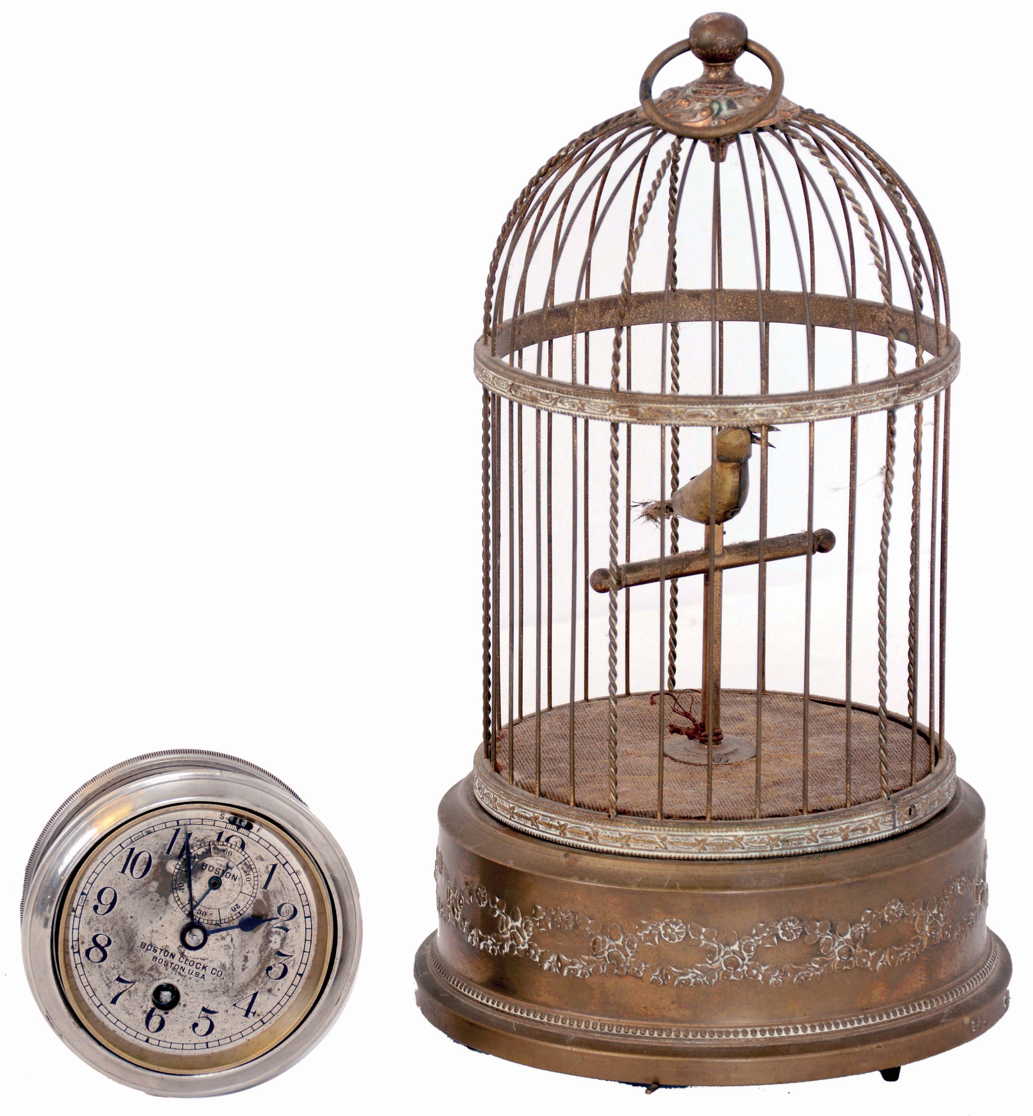 Items- 2 (Two): (1) Boston (Chelsea) Clock Co., "Auto Clock A", 8 days, nickel plated timepiece #12401B, c1912; (2) French "Helvetic" singing bird in brass cage, c1930 — Antique Clocks Price Guide