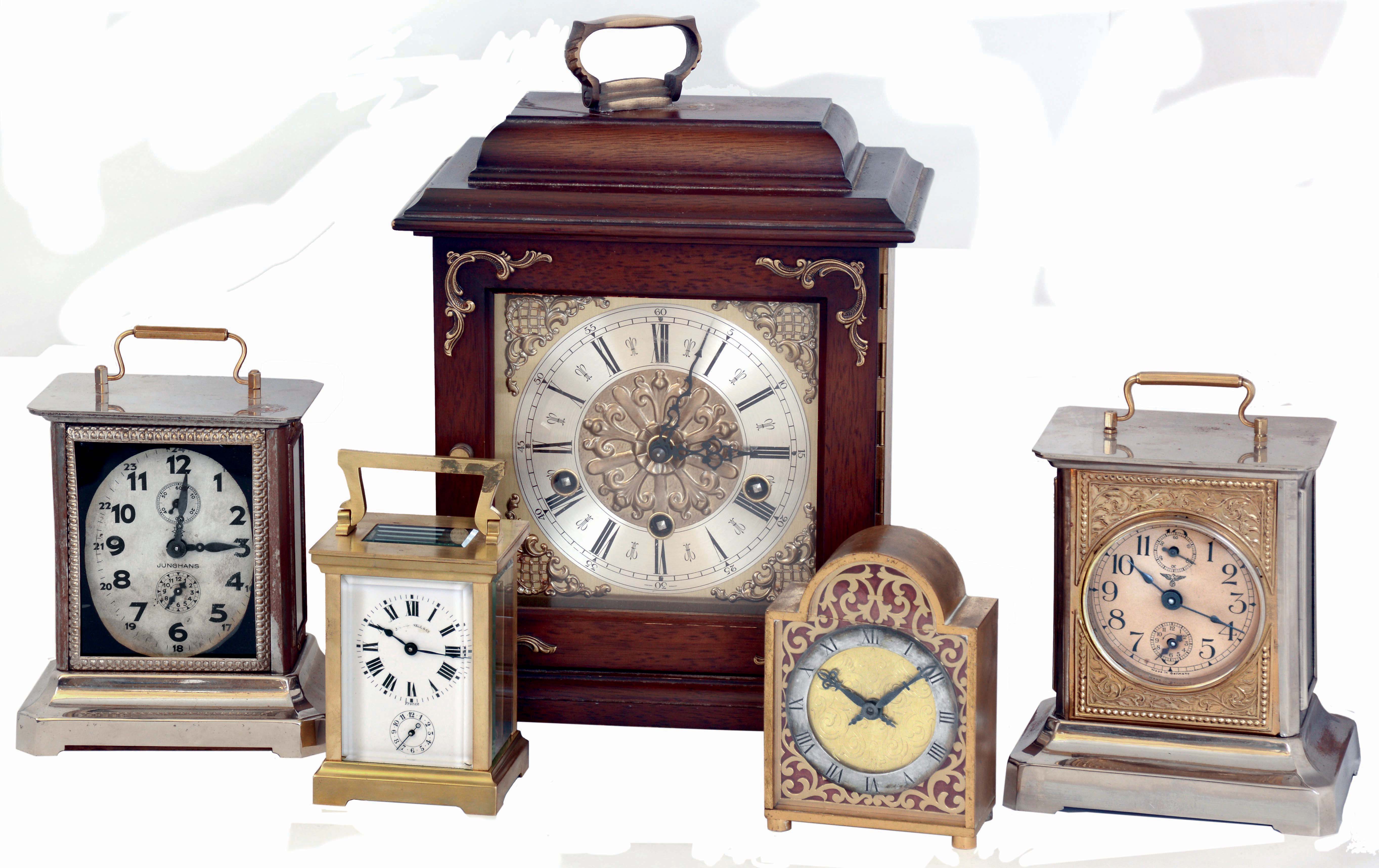 Clocks- 5 (Five) carriage, desk and mantel clocks: French, Duverdrey &amp; Bloquel for J.E. Caldwell, 8 days, time and alarm brass and glass carriage clock; Mauthe German nickel-plate, 30 hours, carriage clock with music box (Home Sweet Home) in base; Ch.Hour, France, arch-top brass, 8 days, time only desk clock; Junghans nickel-plate, 30 hours carriage clock with music box (Carmen) in base; Western Germany hardwood, 8 days, triple-chiming bracket clock with Urgos floating-balance movement. all 20th century — Antique Clocks Price Guide
