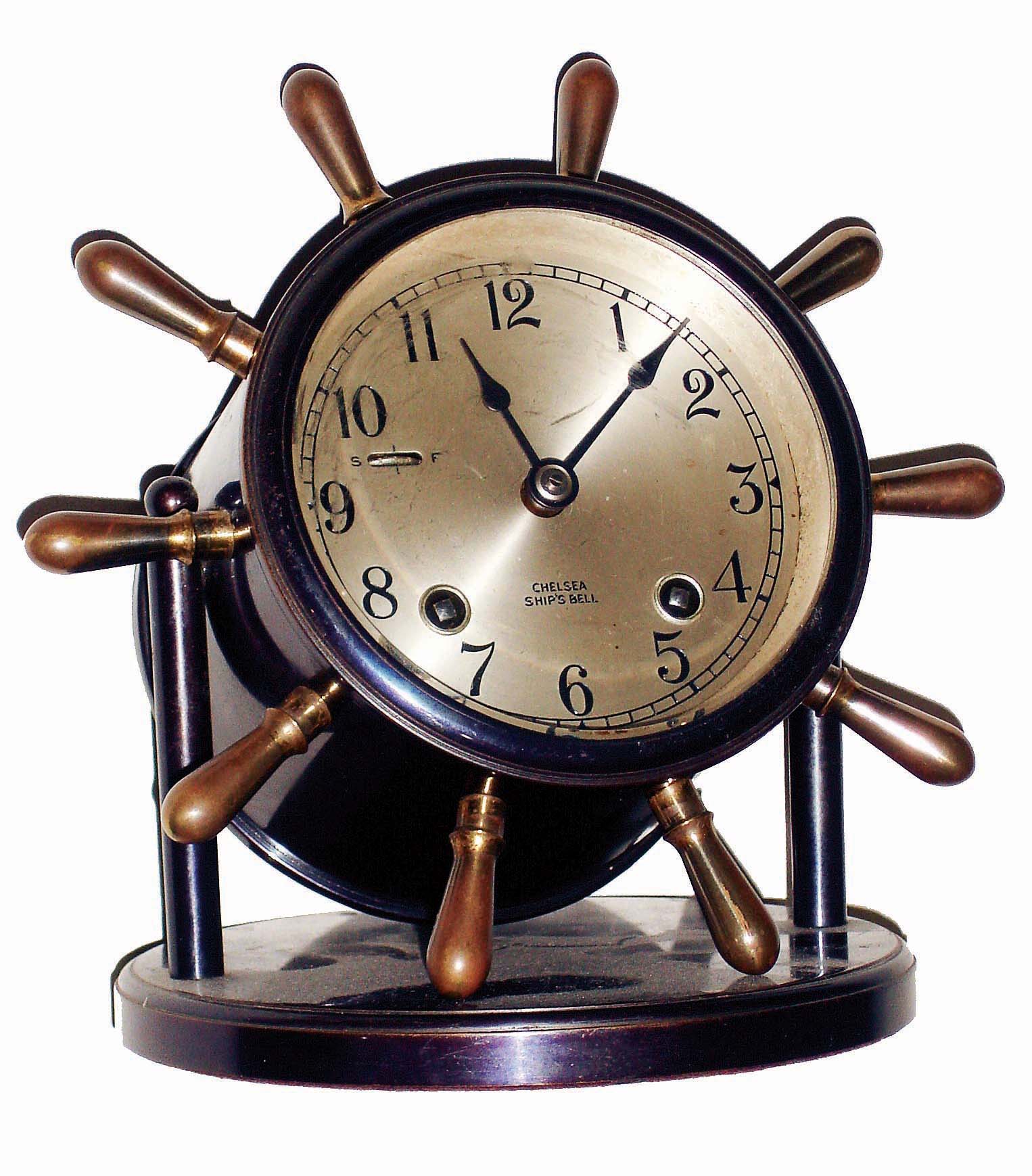 Chelsea Clock Co., Boston, Mass., "Vanderbilt" yacht wheel swivel head, 8 days, ship's bells desk clock, bronze finish, hinged bezel, #590600, c1954 — Antique Clocks Price Guide