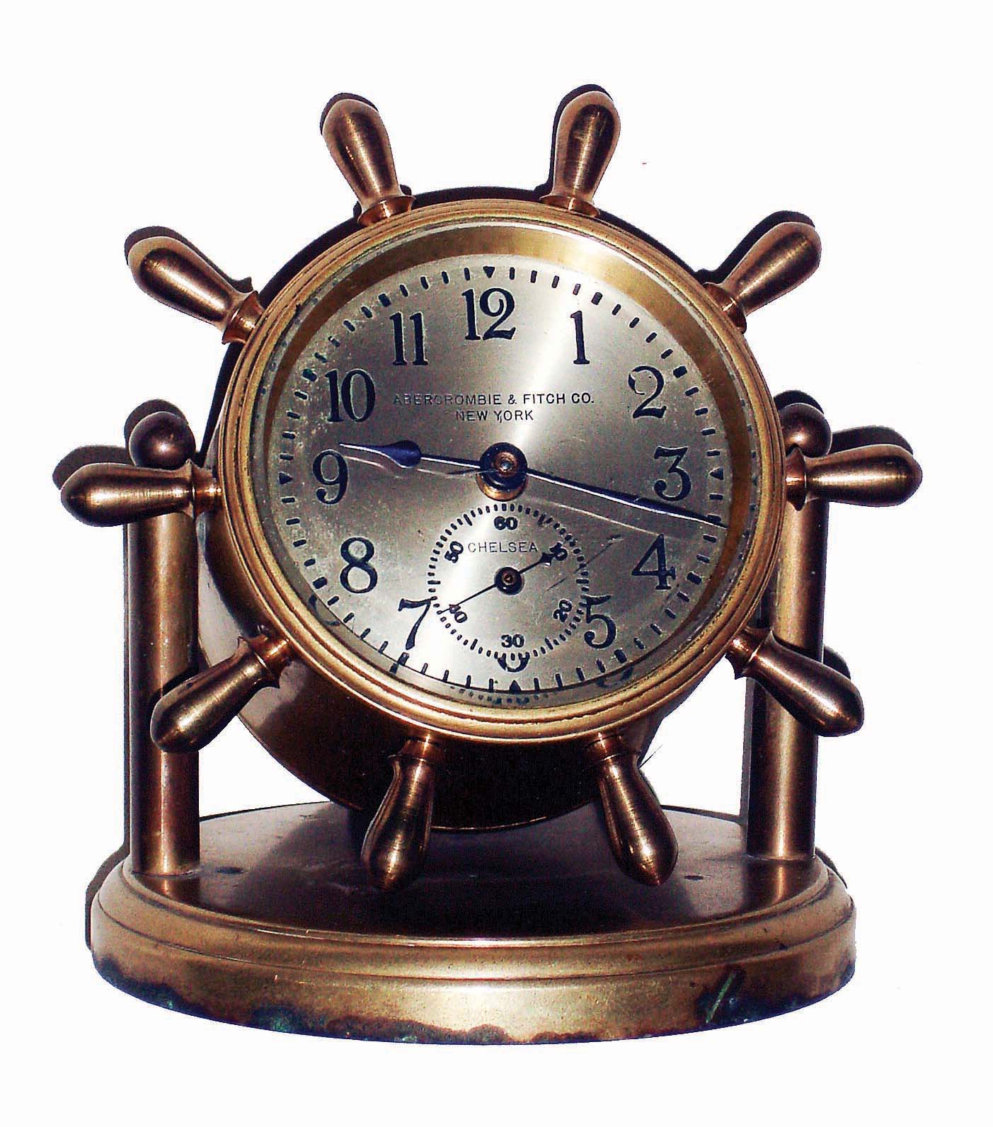 Chelsea Clock Co., Boston, Mass., for Abercrombie &amp; Fitch Co., New York, NY, "Clinton", brass, 8 days, time only swivel head yacht wheel desk clock, 2 3/4" dial, c1930 — Antique Clocks Price Guide