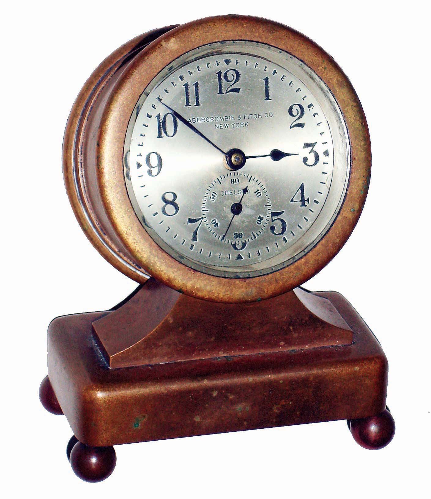 Chelsea Clock Co., Boston, Mass., for Abercrombie &amp; Fitch, New York, NY, "Lexington", offset model 2 3/4" dial, 8 days, time only brass desk clock, #152261, 1922 — Antique Clocks Price Guide