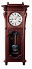 Seth Thomas Clock Co., Thomaston, Conn., "Marcy" wall clock in a walnut case with a three train, 8 days, spring driven movement, striking the quarter hours on 2 cup bells and the hours on a cathedral gong, c1886.