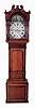 Tall clocks- 2 (Two) English / Scottish: (1) W. Moorhouse, England or Scotland, tall clock, 8 days, time and strike, weight driven movement in an oak case with mahogany banding and painted metal dial, c1840; (2) I. Wilson, Sheffield, England, tall clock, 8 days, time and strike, weight driven movement in an oak case with mahogany veneers, stringing, and with marquetry shell in trunk door, painted metal dial, c1840
