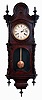 Welch, Spring & Co., Forestville, Conn., "Regulator No. 4" hanging clock in a walnut case with a spring driven, double wind 30 day timepiece movement, c1874.
