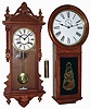 Clocks- 7 (Seven) wood case modern reproduction wall clocks: Seth Thomas No. 2-style; 3 octagon-top schools clocks; 3 other hanging clocks; late 20th century