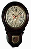 Clocks- 2 (Two), 8 days, wood case wall clocks: Ingraham "Dew Drop" rosewood-grained time and calendar; Junghans German walnut, time and strike, spring wound with unusual keyhole-style front door; early 20th century